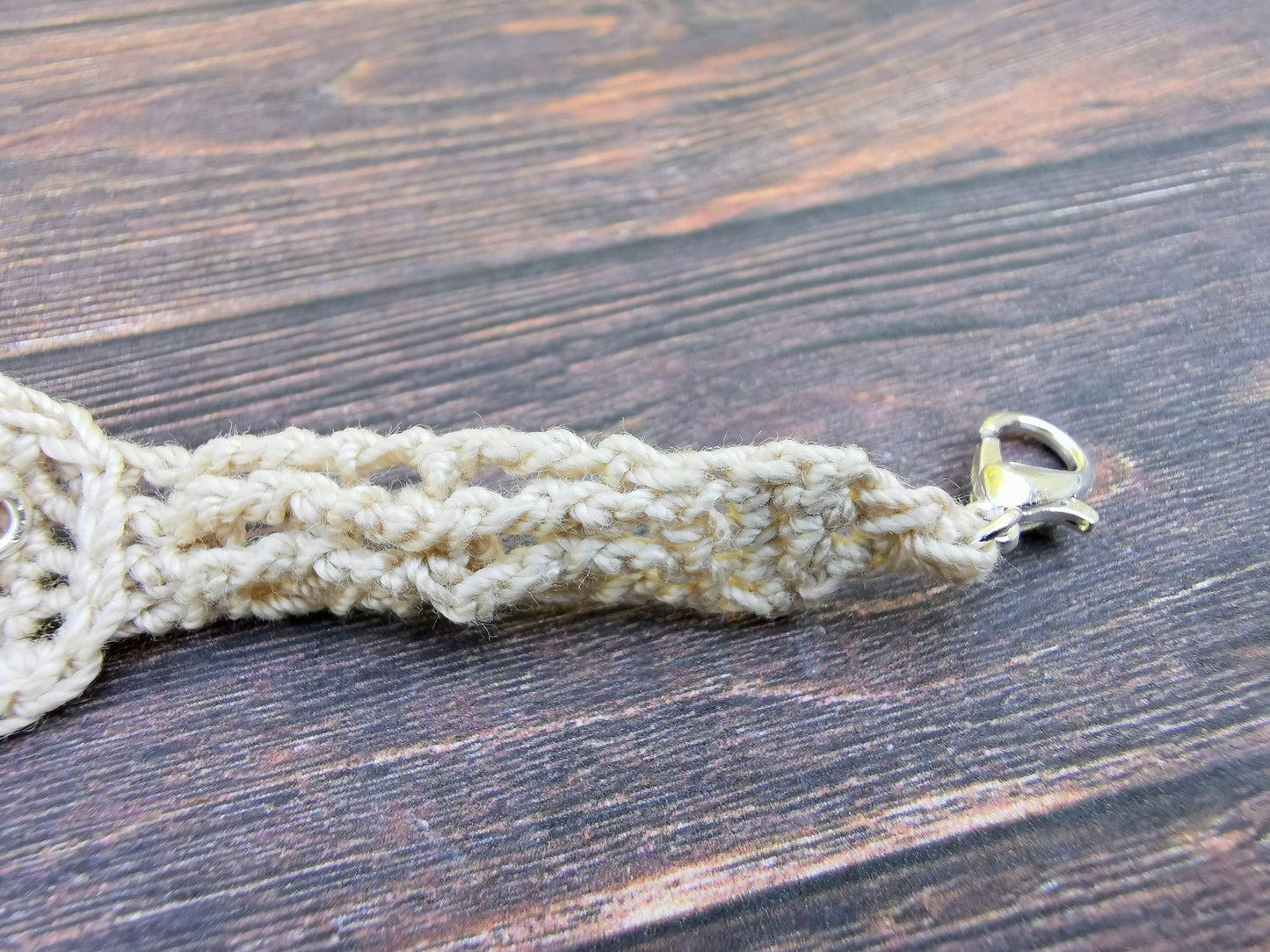 Crochet tree bracelet with a red tiger's eye gemstone
