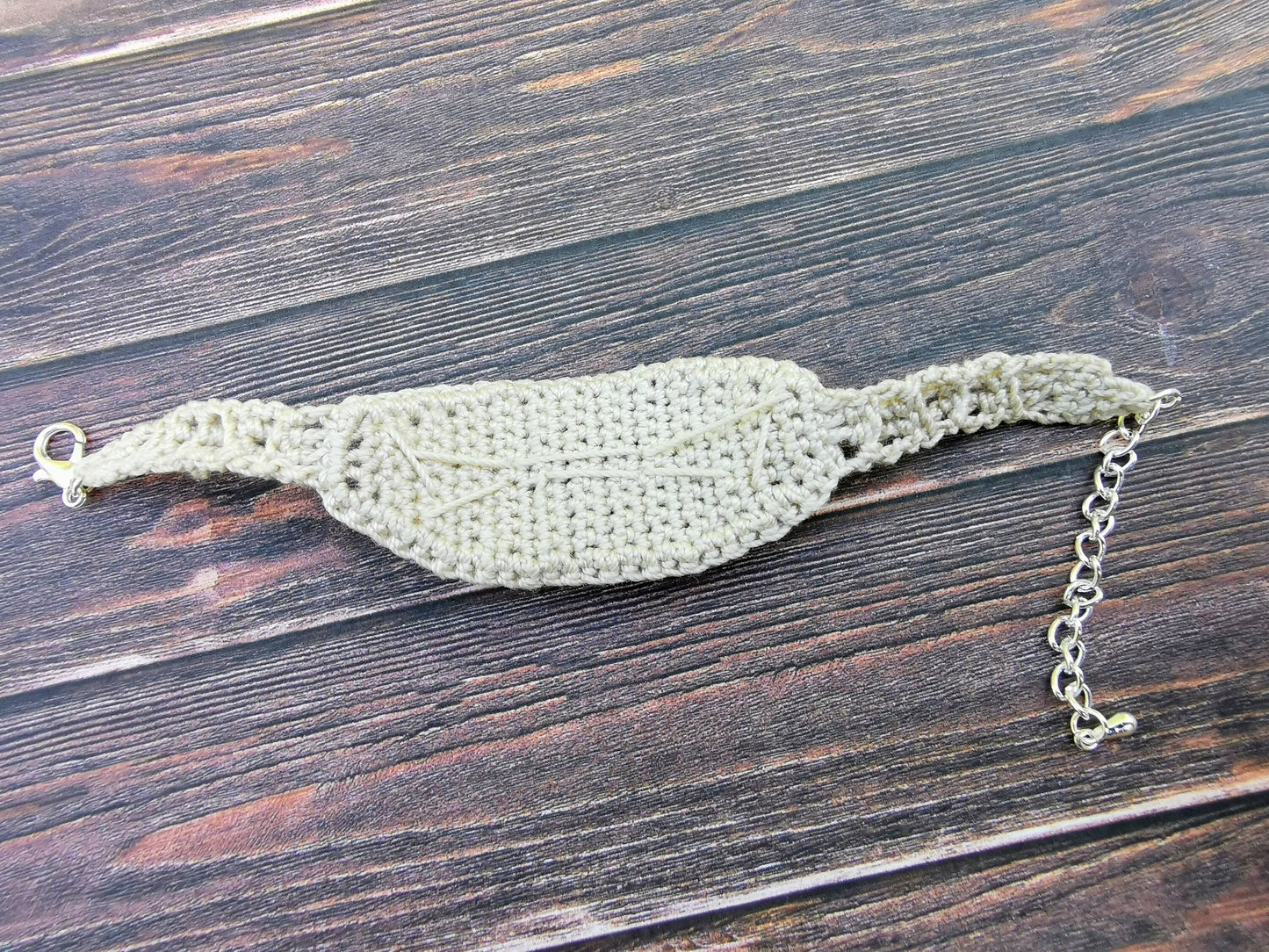 Crochet tree bracelet with a red tiger's eye gemstone