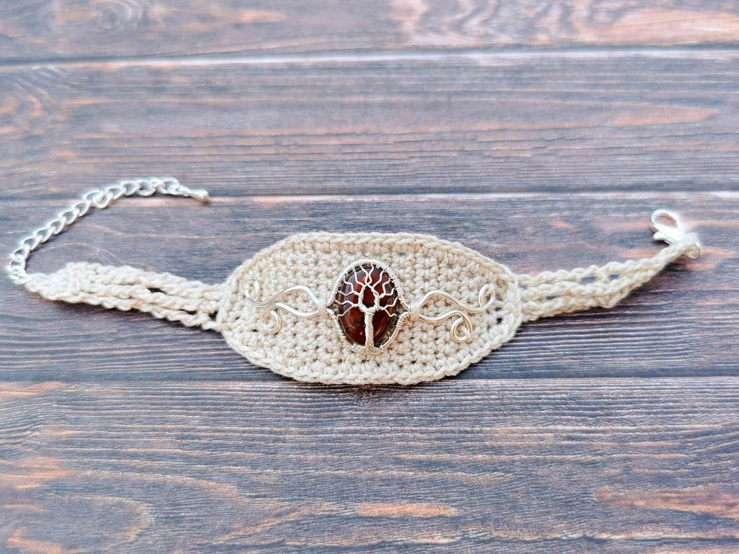 Crochet tree bracelet with a red tiger's eye gemstone