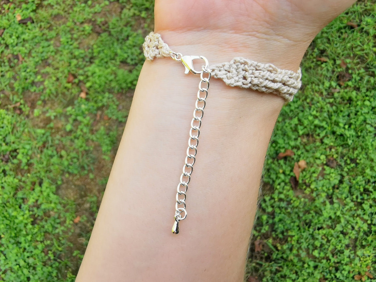 Crochet tree bracelet with a red tiger's eye gemstone