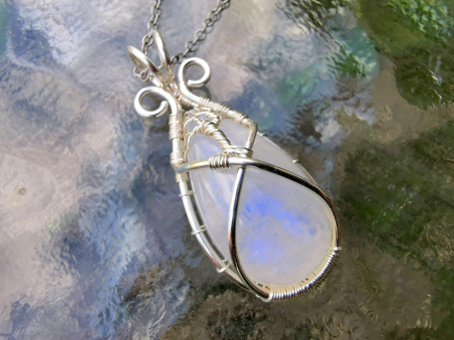 Tree pendant with a moonstone gemstone