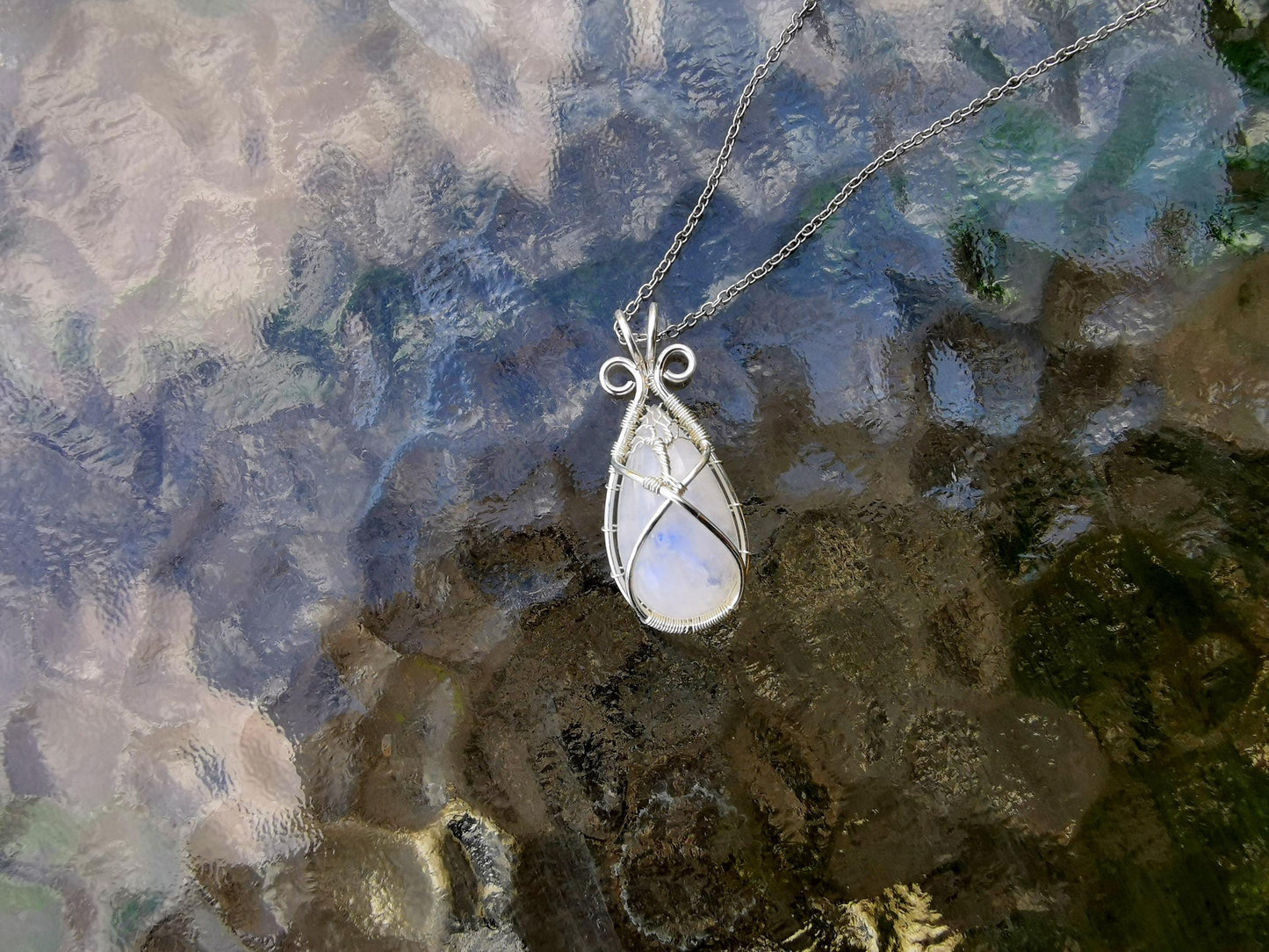 Tree pendant with a moonstone gemstone