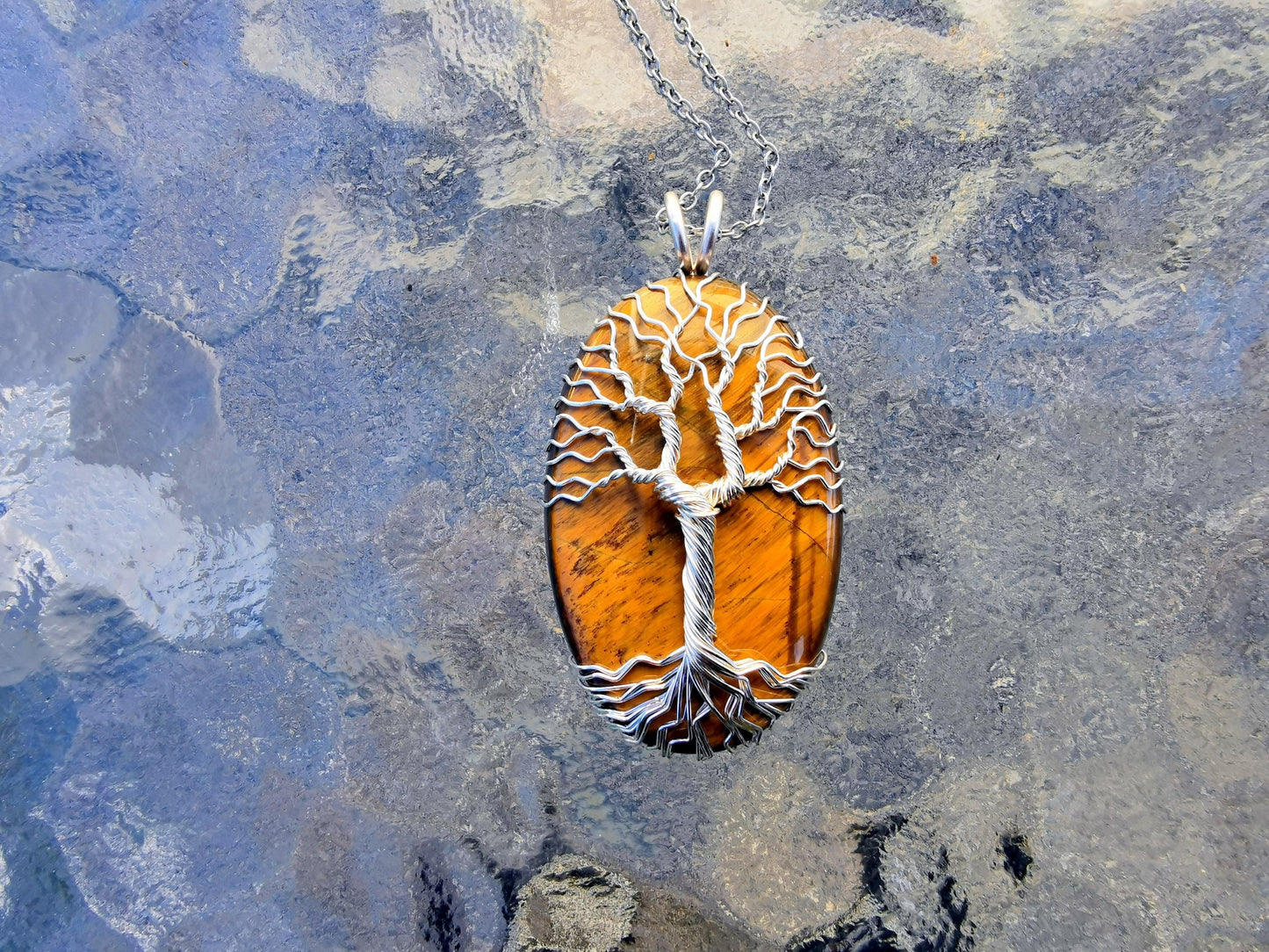 Tree pendant with a tiger's eye gemstone