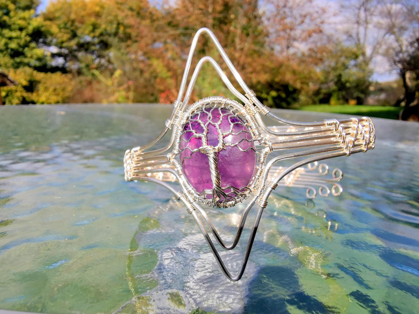 Tree arm ring with an amethyst gemstone