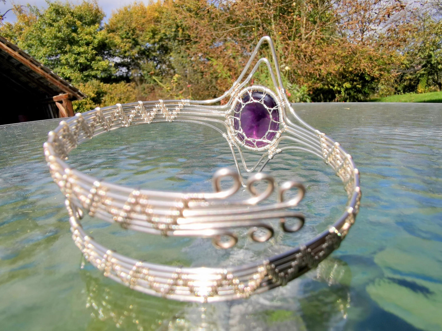 Tree arm ring with an amethyst gemstone