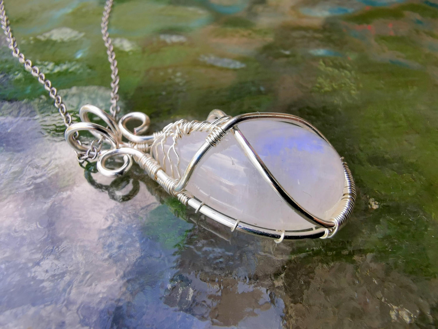 Tree pendant with a moonstone gemstone