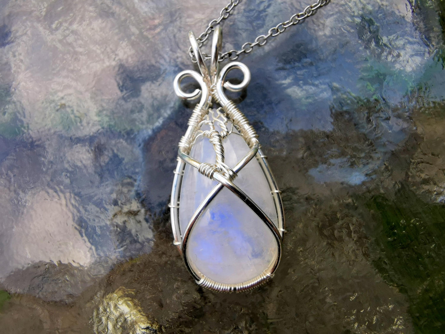 Tree pendant with a moonstone gemstone