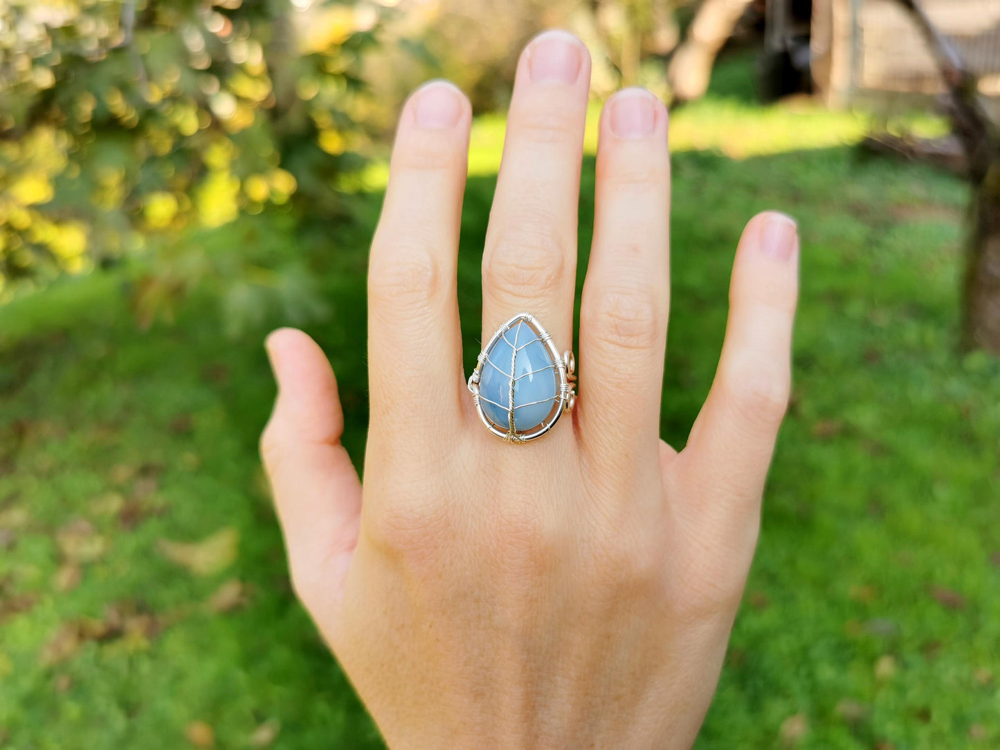 Leaf ring with a blue opal gemstone