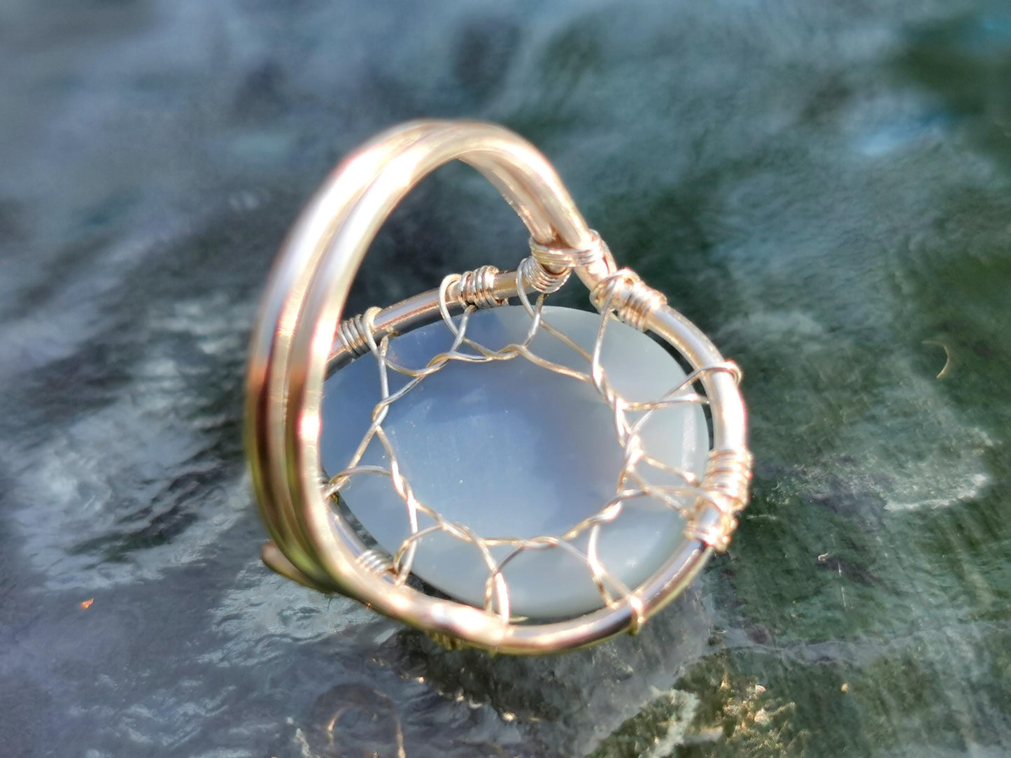 Leaf ring with a blue opal gemstone
