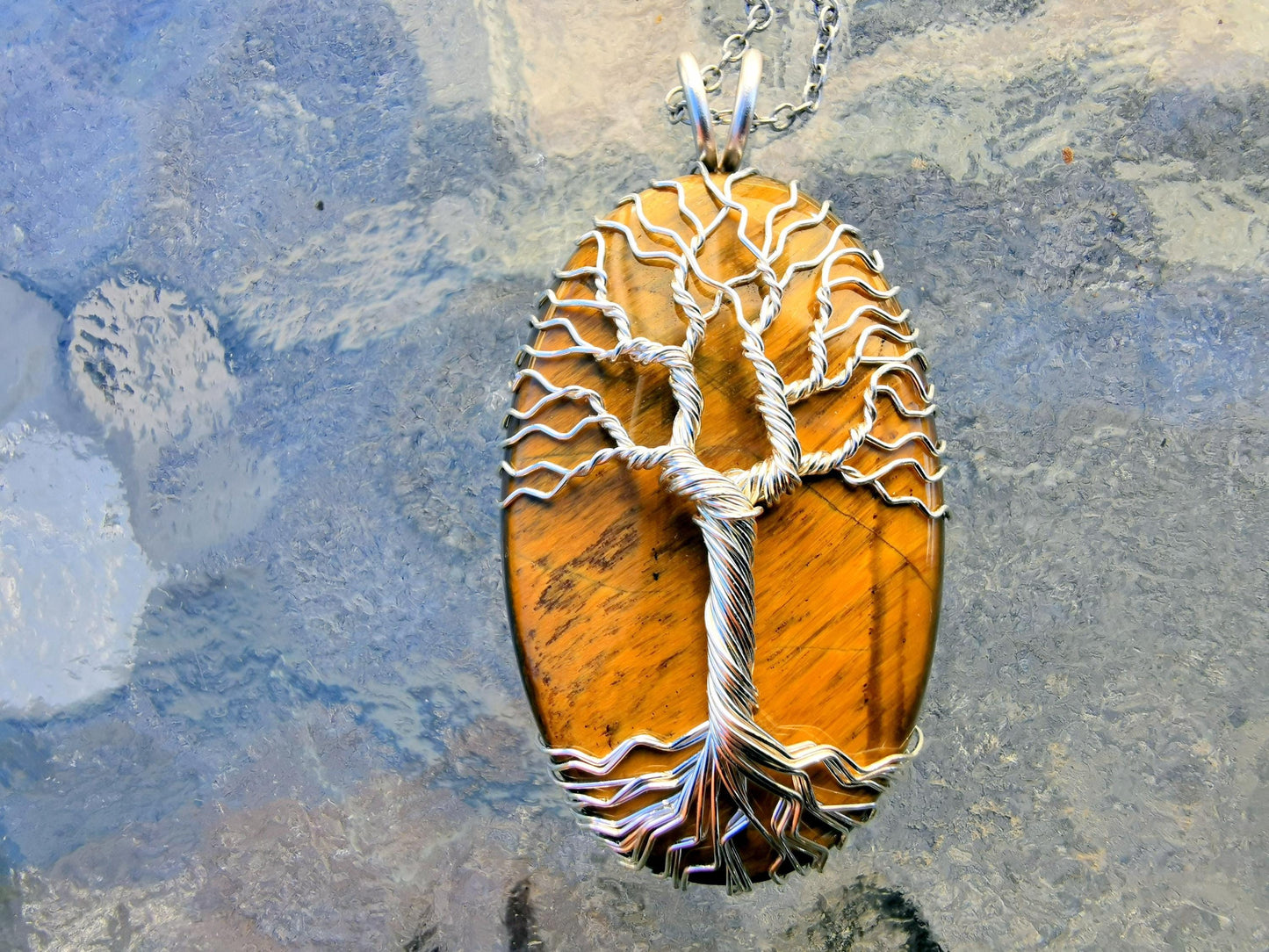 Tree pendant with a tiger's eye gemstone