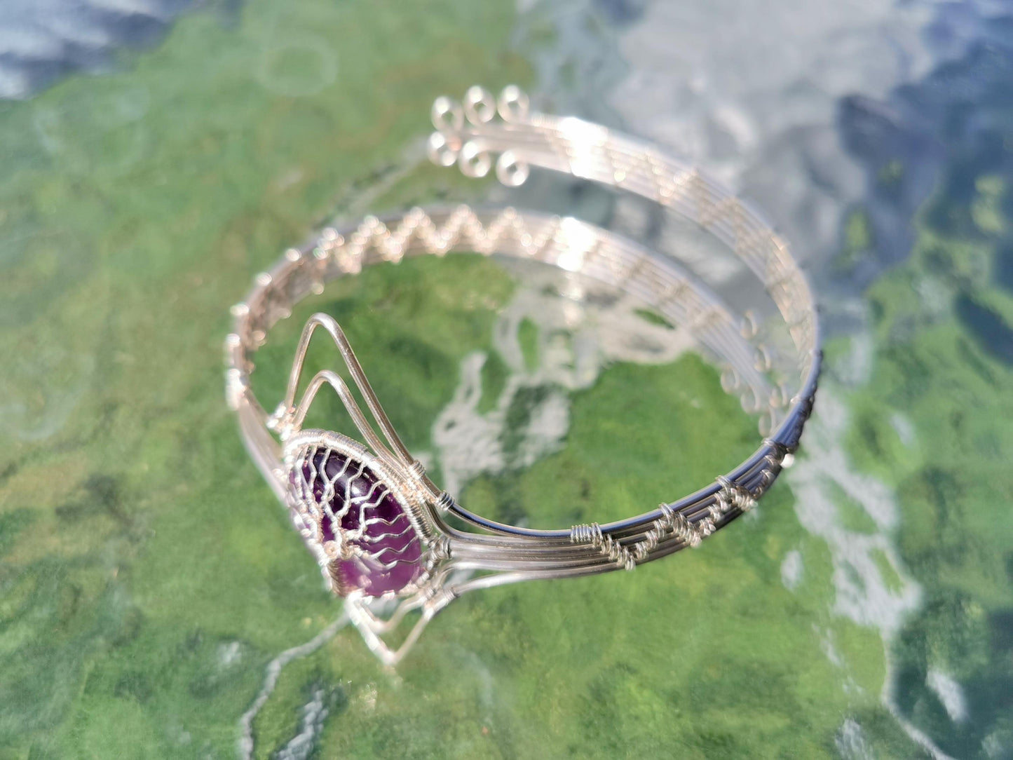 Tree arm ring with an amethyst gemstone