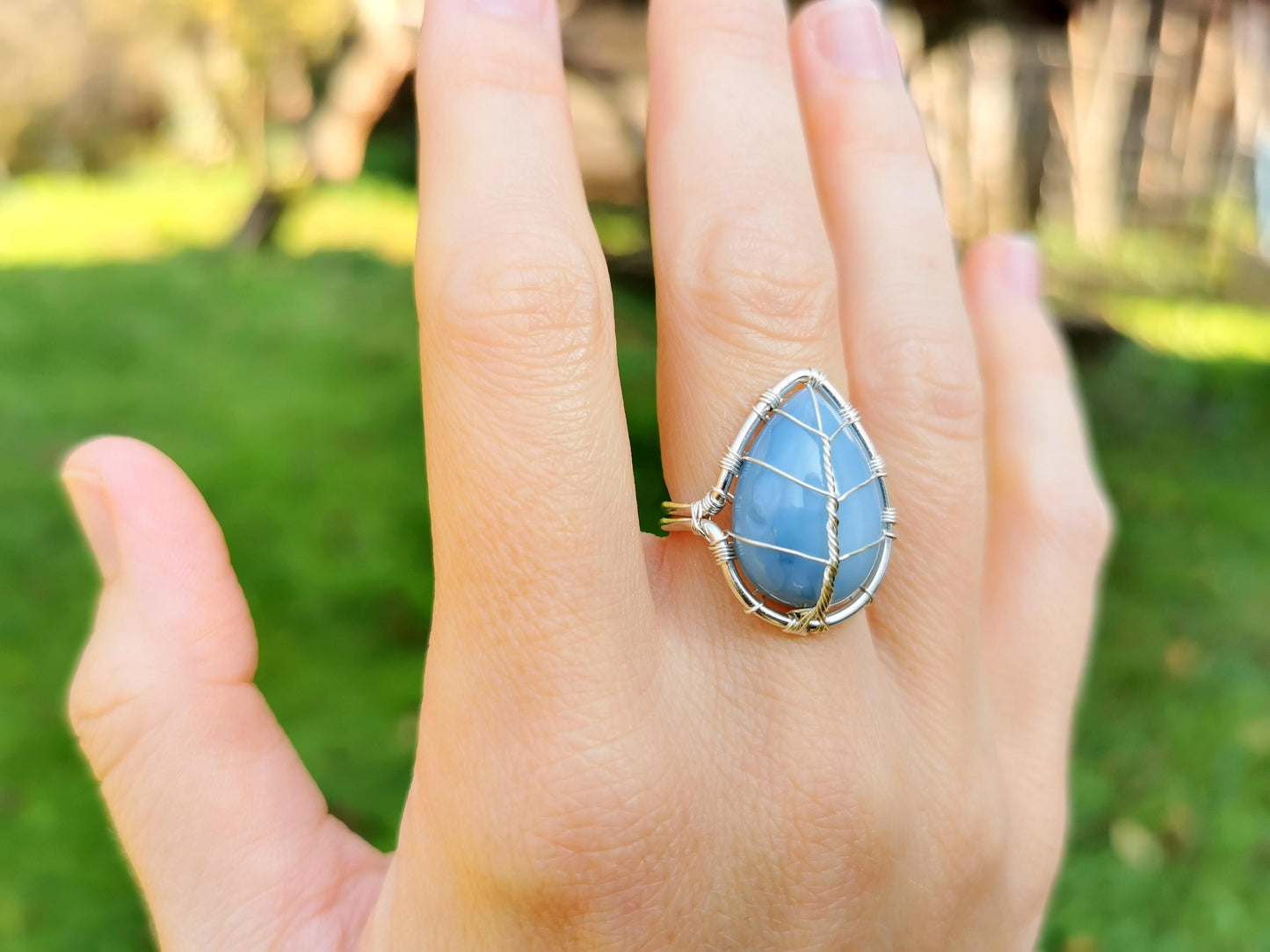 Leaf ring with a blue opal gemstone