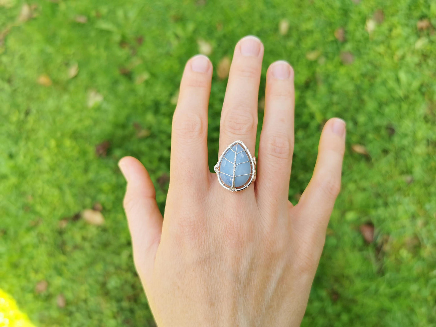 Leaf ring with a blue opal gemstone