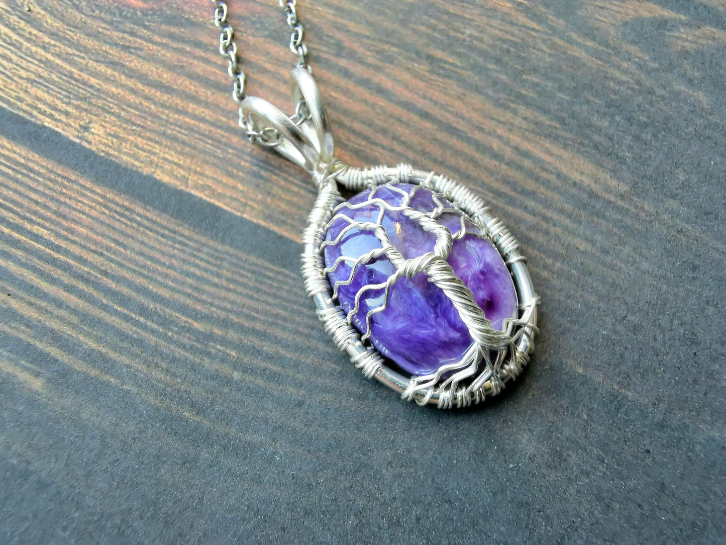 Tree pendant with a charoite gemstone