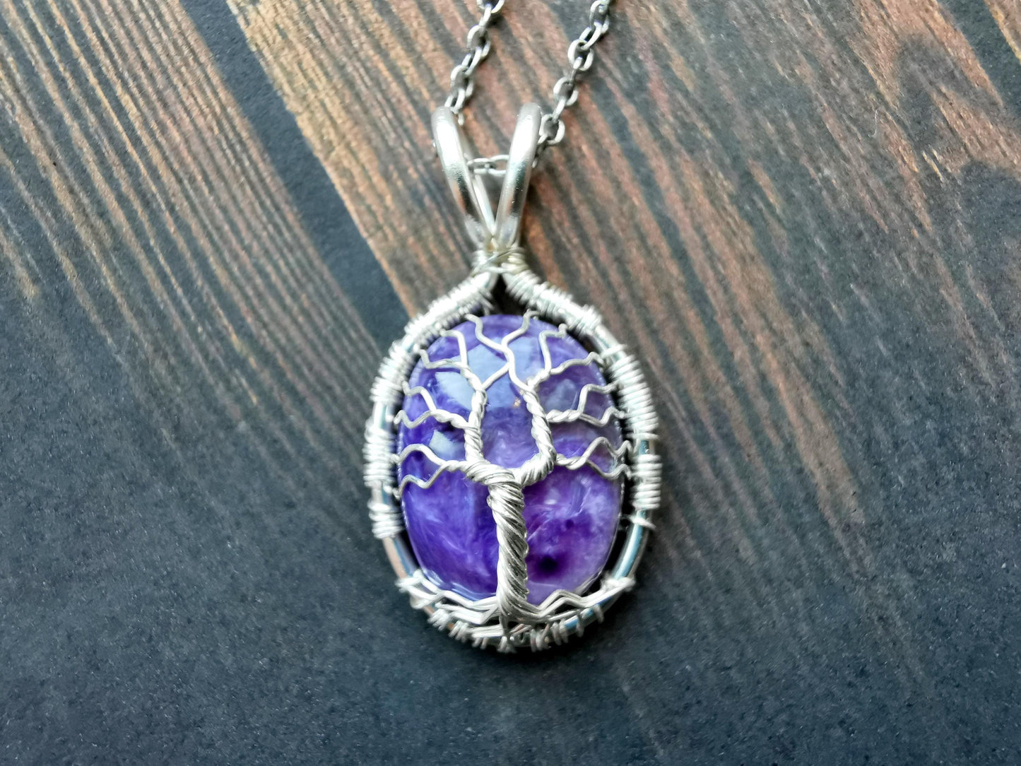 Tree pendant with a charoite gemstone