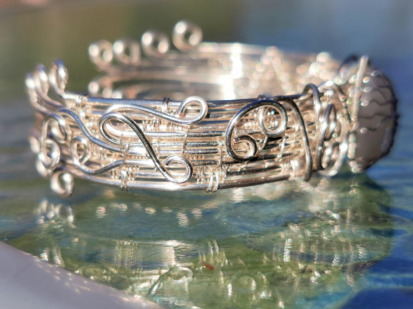 Cuff tree bracelet with a moonstone