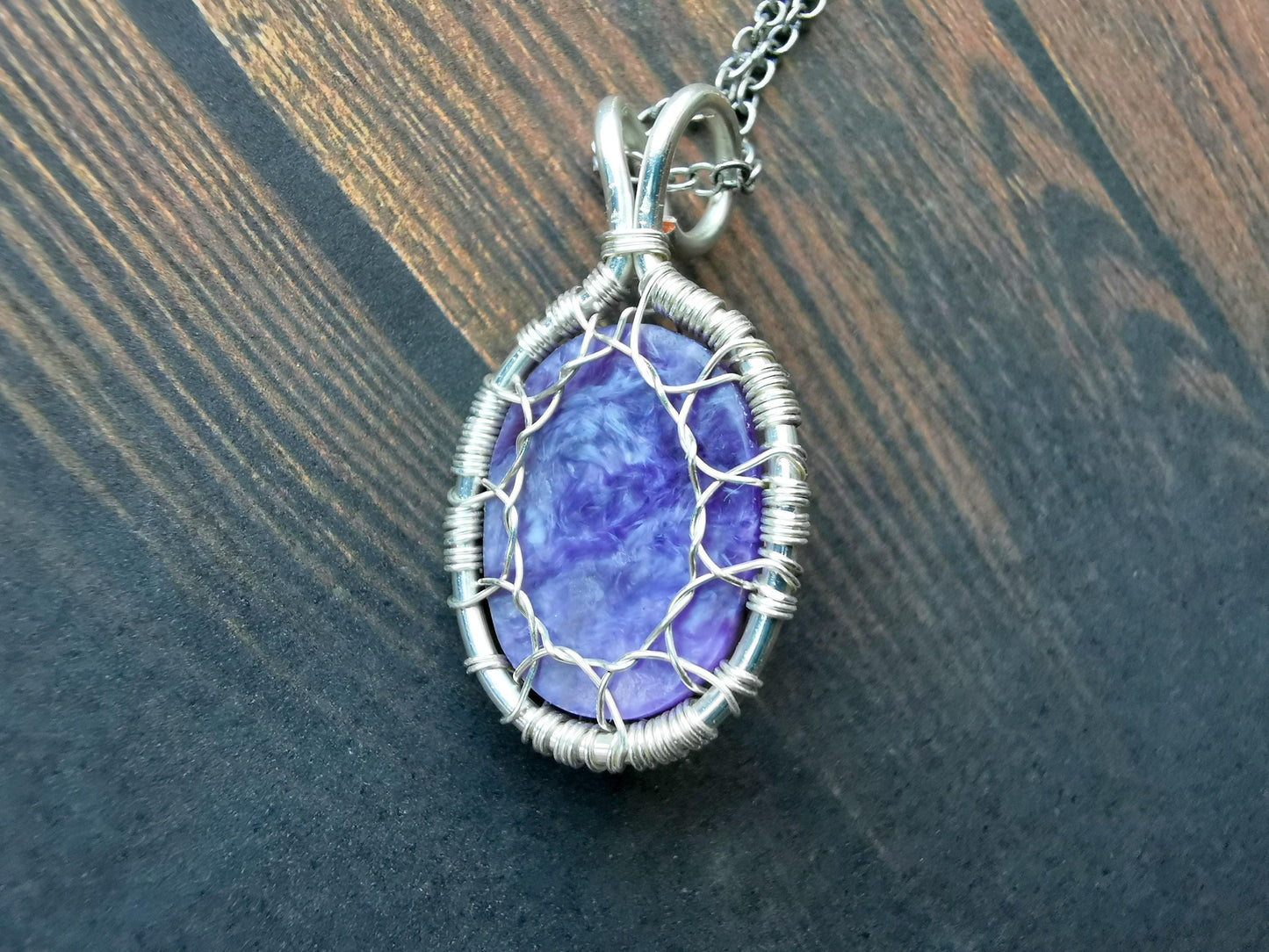 Tree pendant with a charoite gemstone