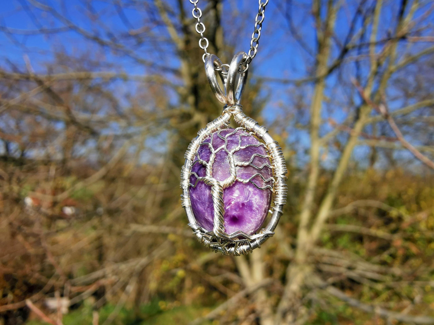 Tree pendant with a charoite gemstone