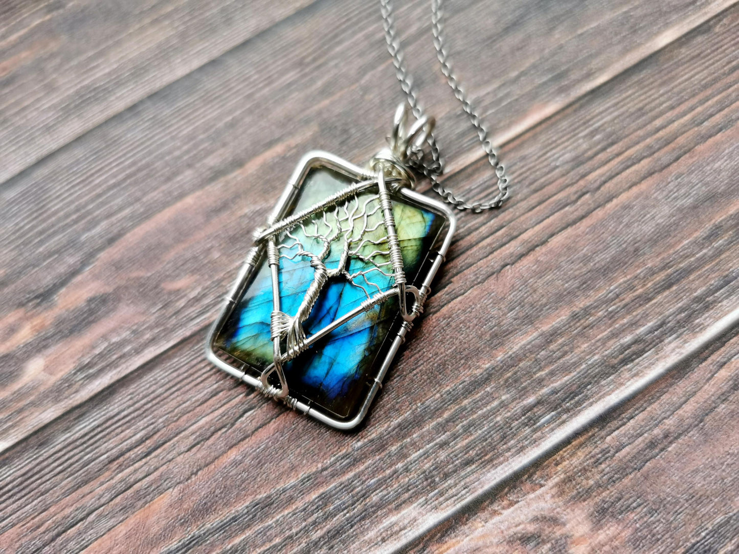Tree pendant with a labradorite gemstone