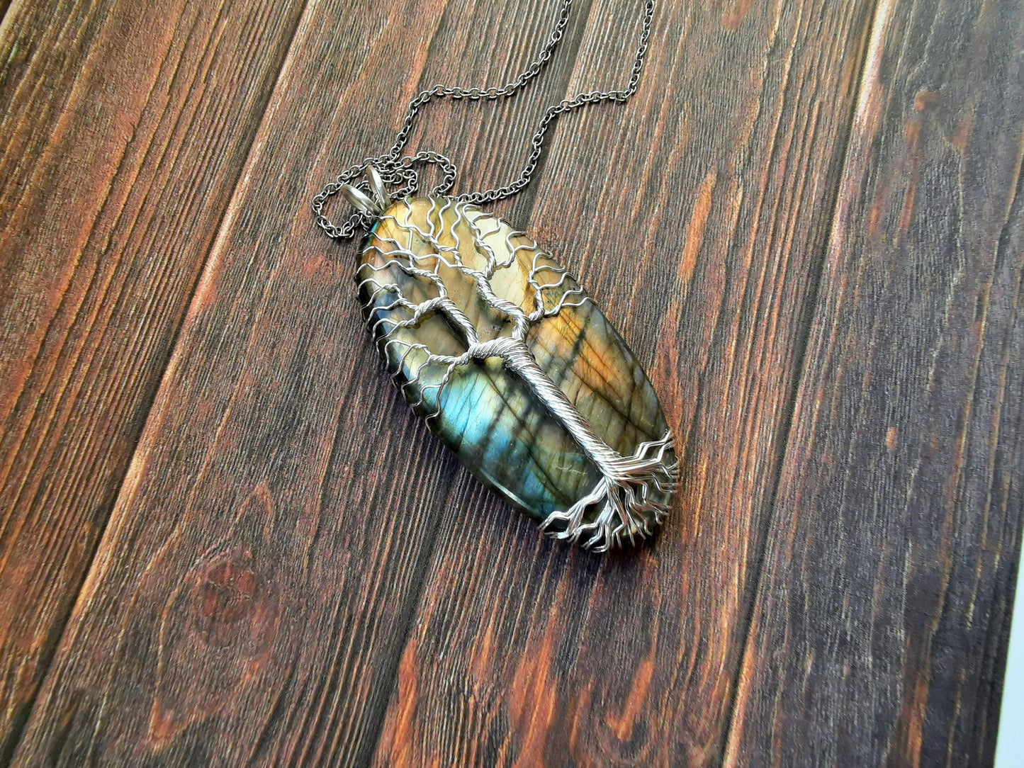 Tree pendant with a labradorite gemstone