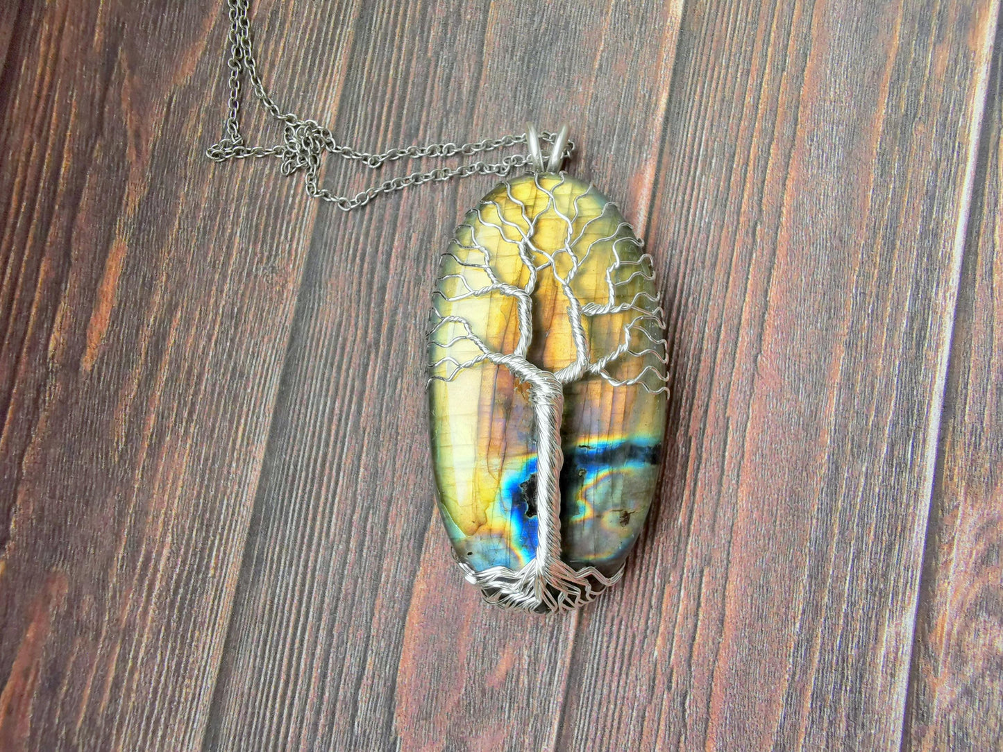 Tree pendant with a labradorite gemstone