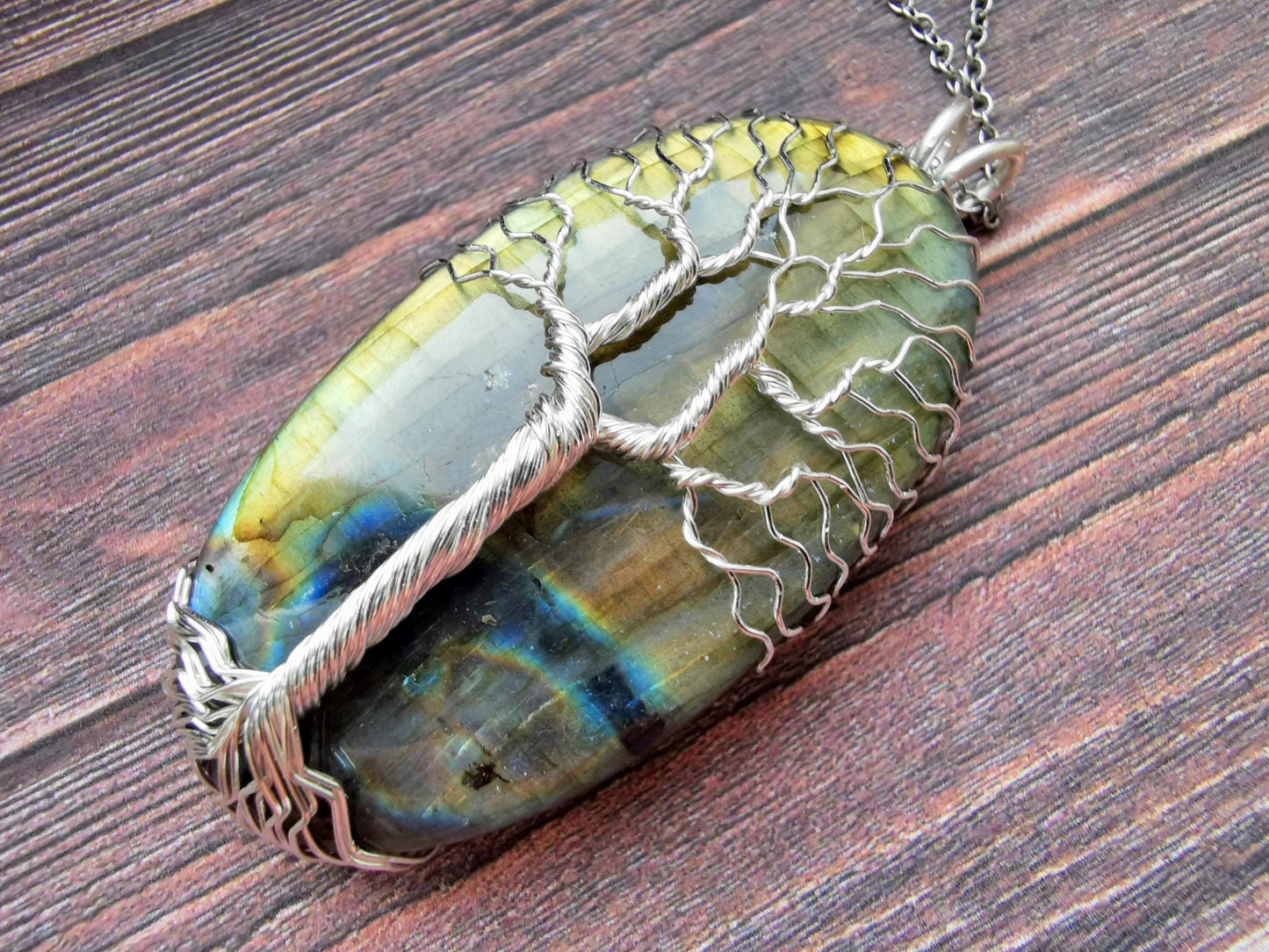 Tree pendant with a labradorite gemstone