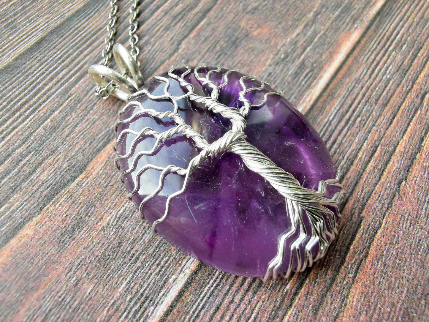 Tree pendant with an amethyst gemstone