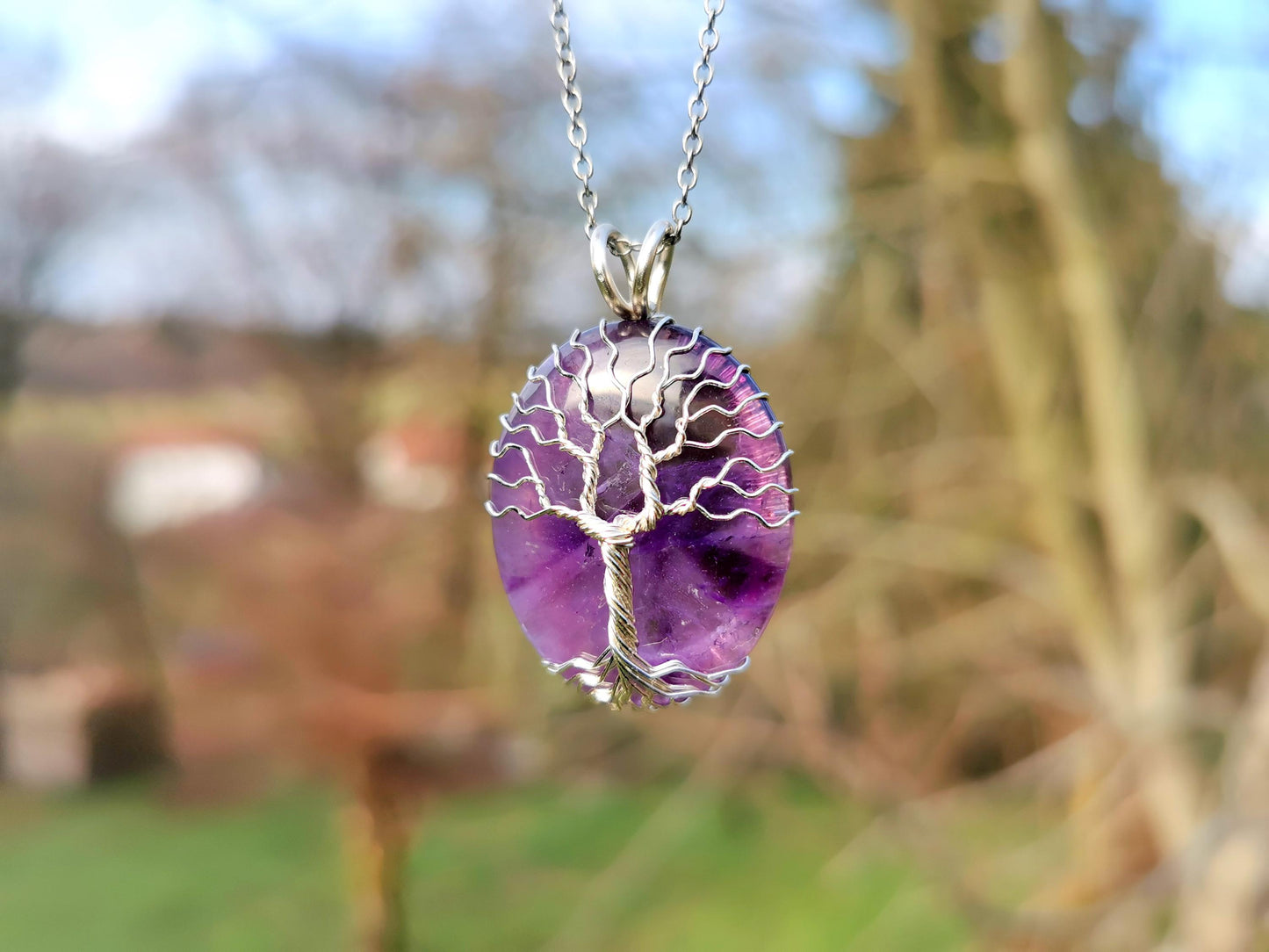 Tree pendant with an amethyst gemstone