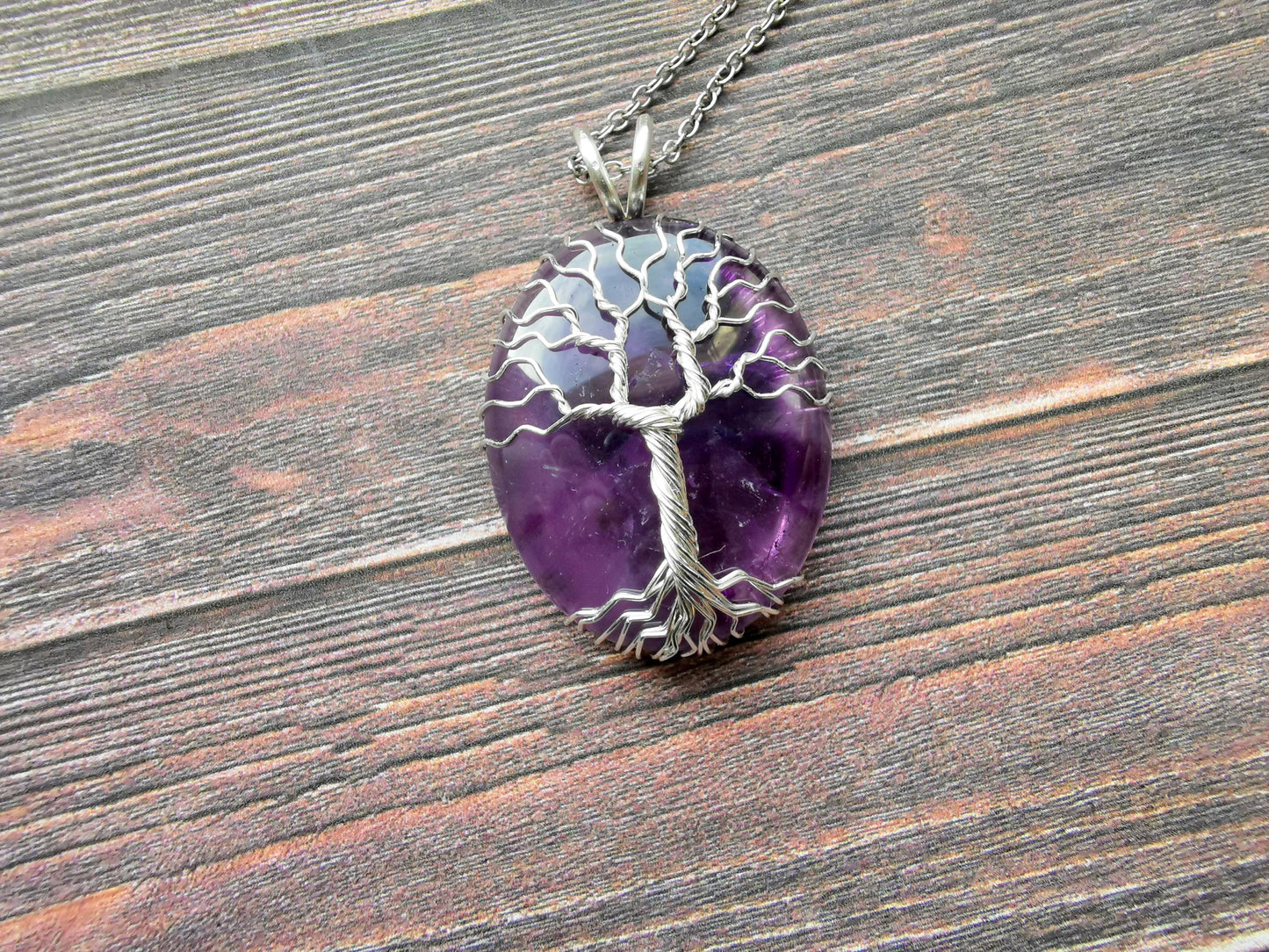 Tree pendant with an amethyst gemstone