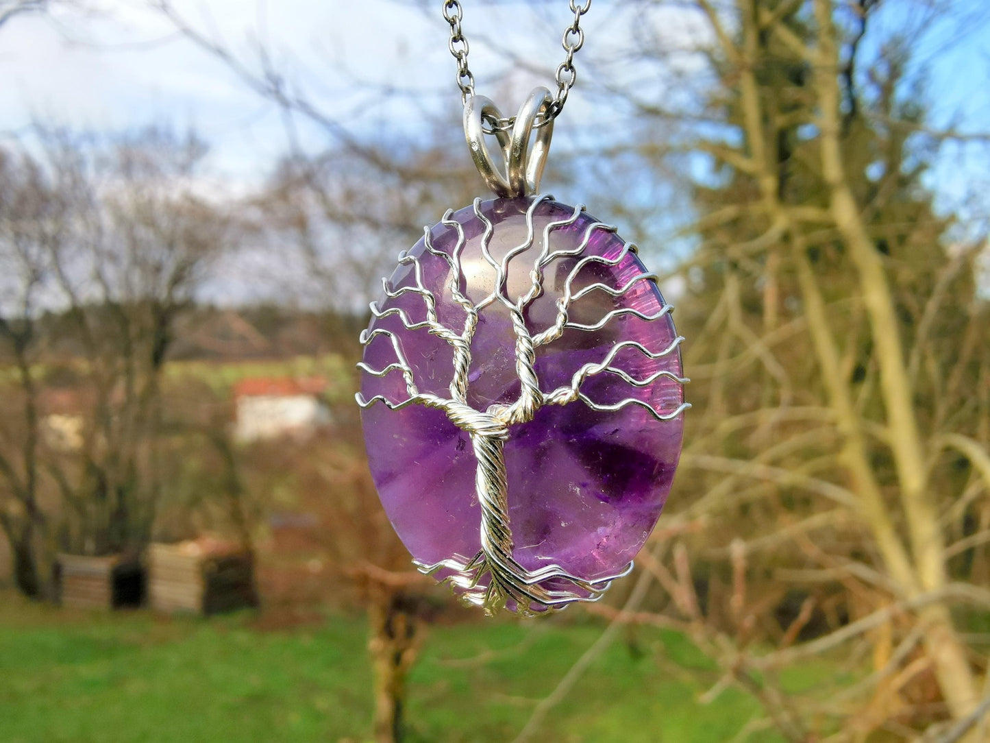 Tree pendant with an amethyst gemstone