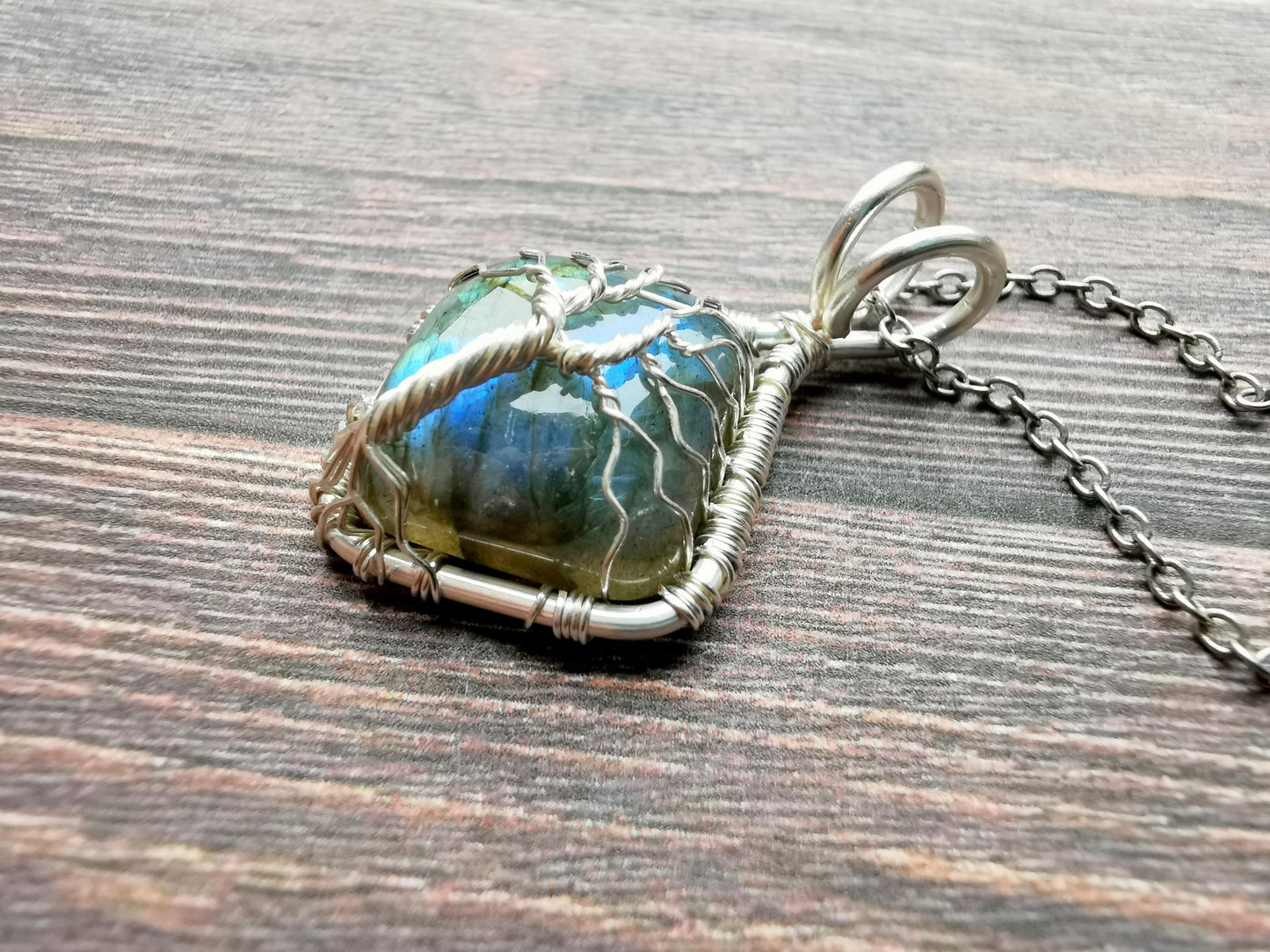 Tree pendant with a labradorite gemstone