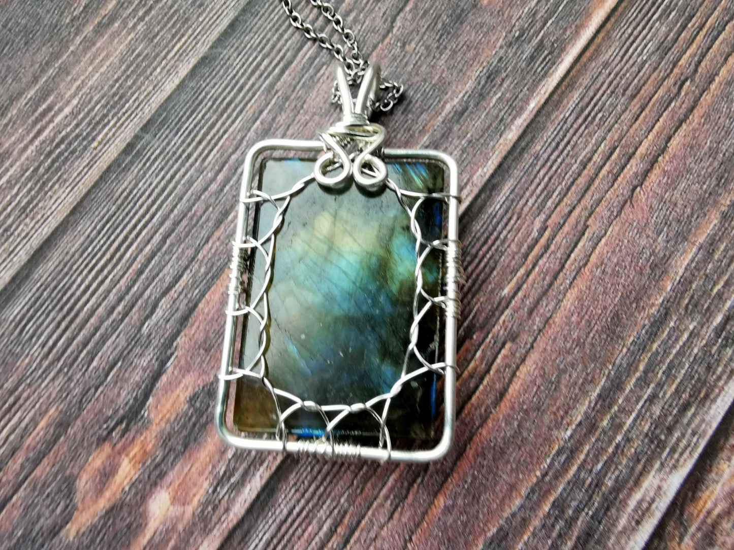 Tree pendant with a labradorite gemstone