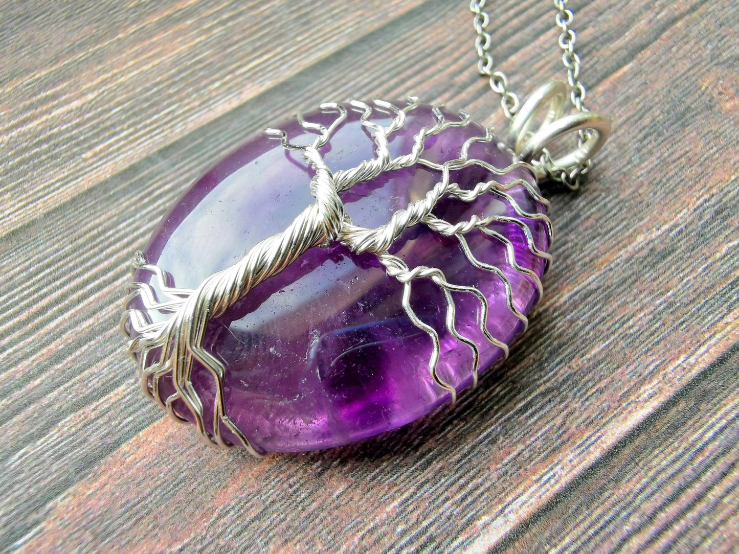 Tree pendant with an amethyst gemstone