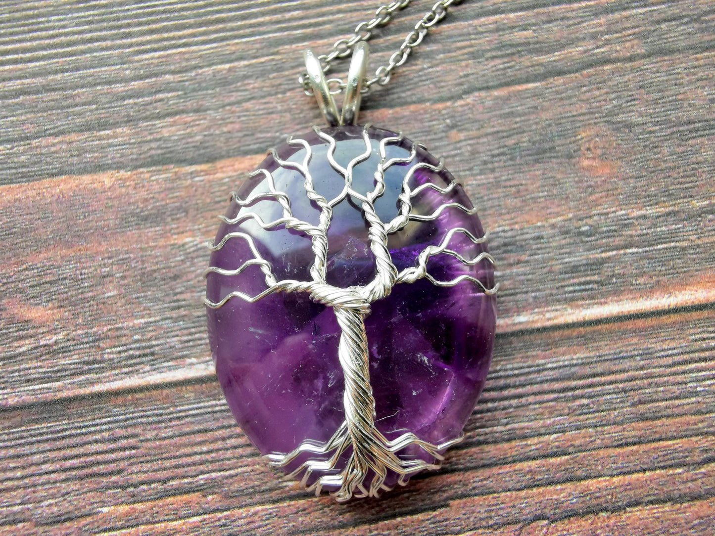 Tree pendant with an amethyst gemstone