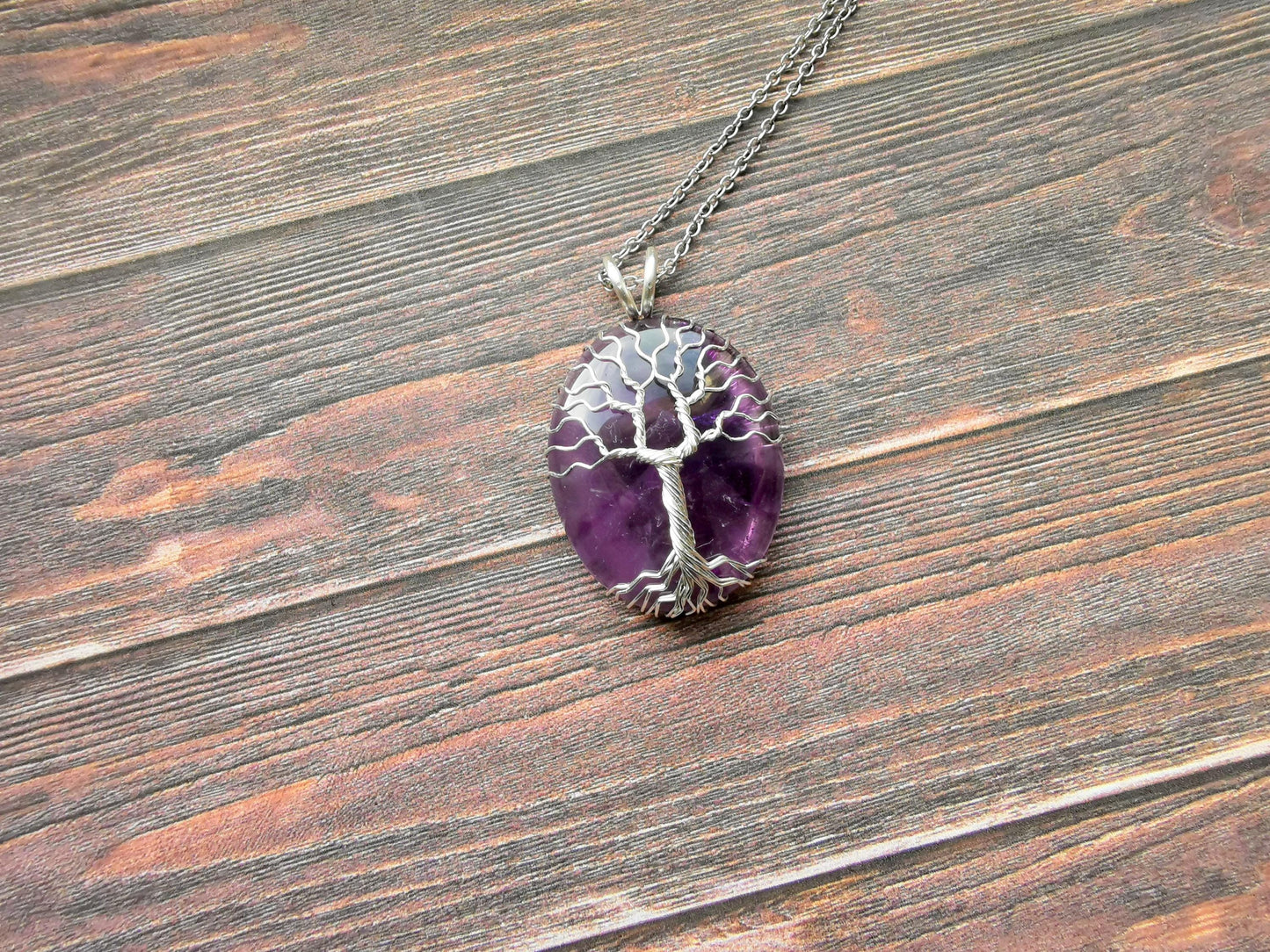 Tree pendant with an amethyst gemstone