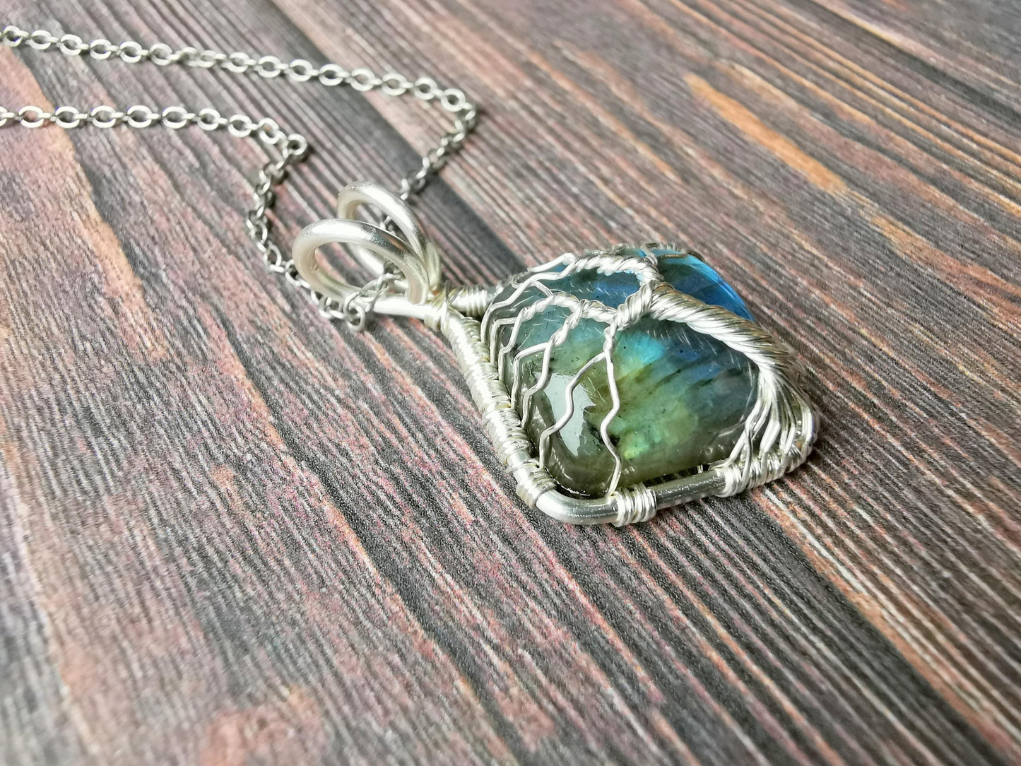 Tree pendant with a labradorite gemstone