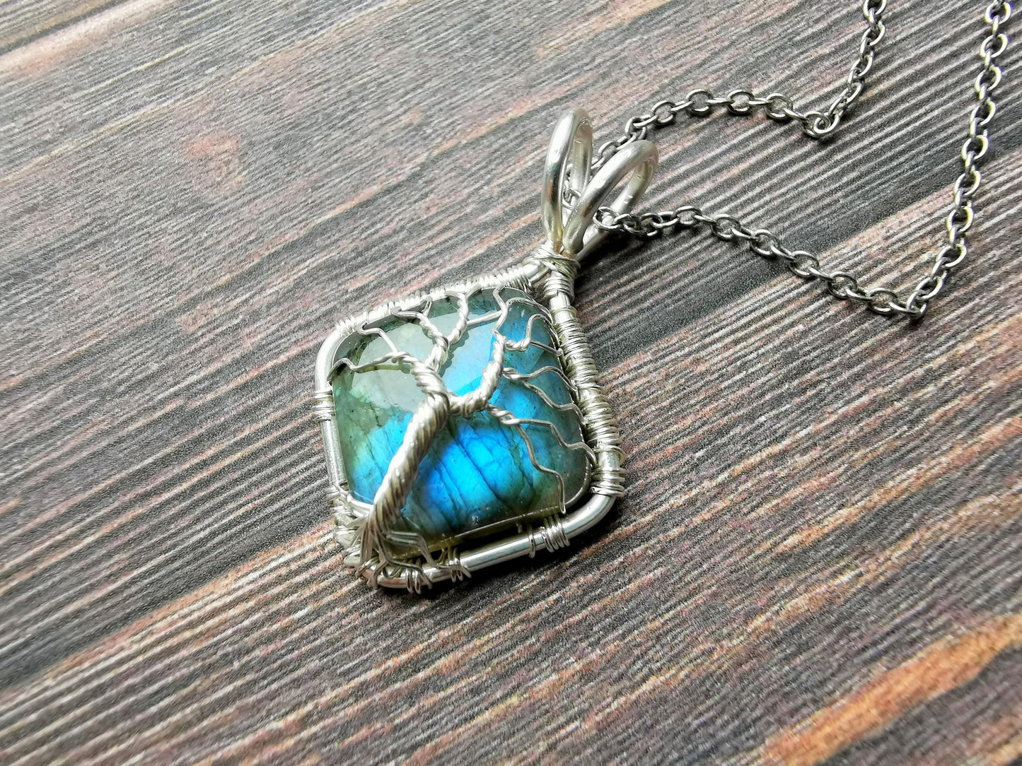 Tree pendant with a labradorite gemstone