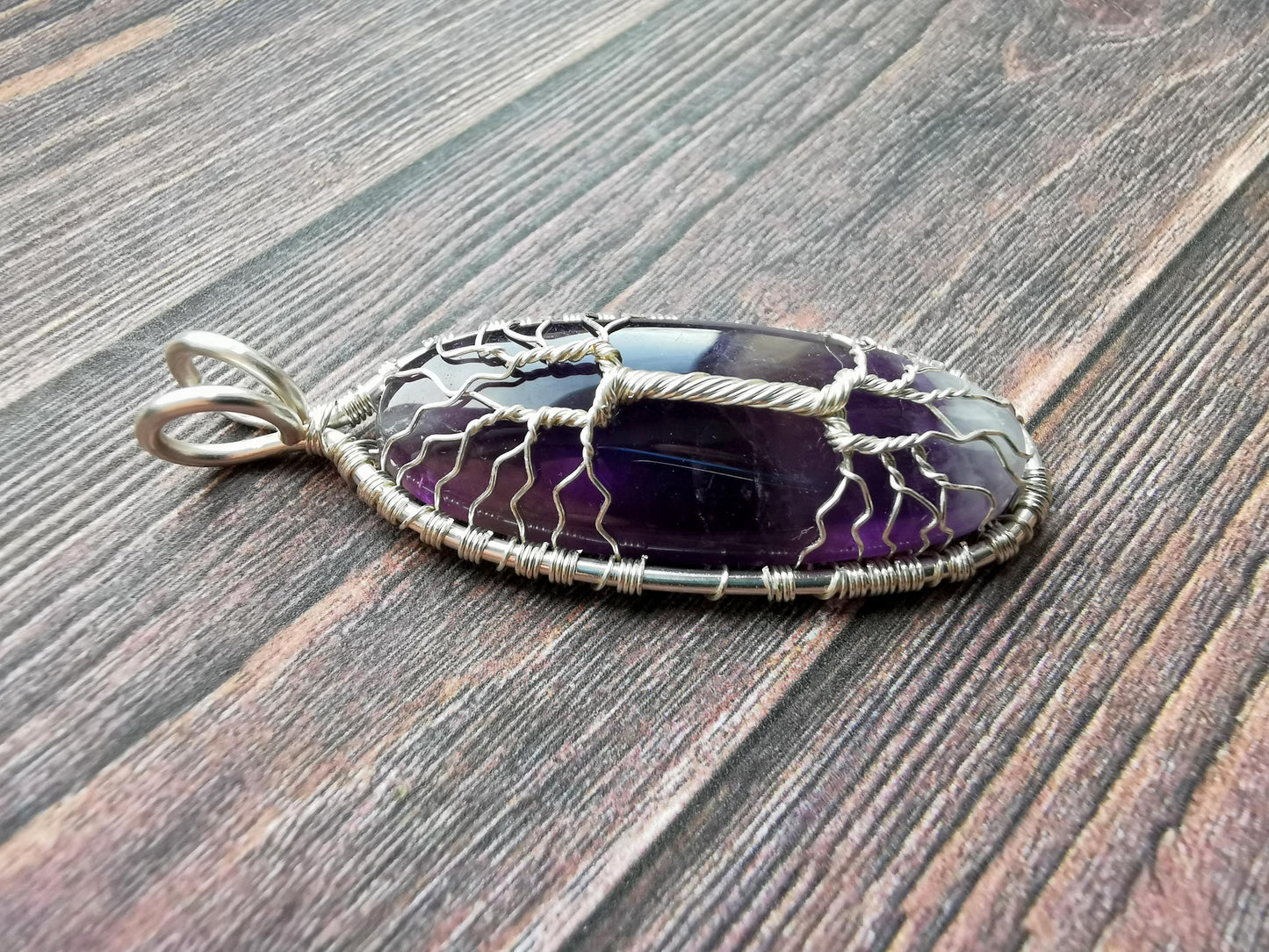 Tree pendant with an amethyst gemstone