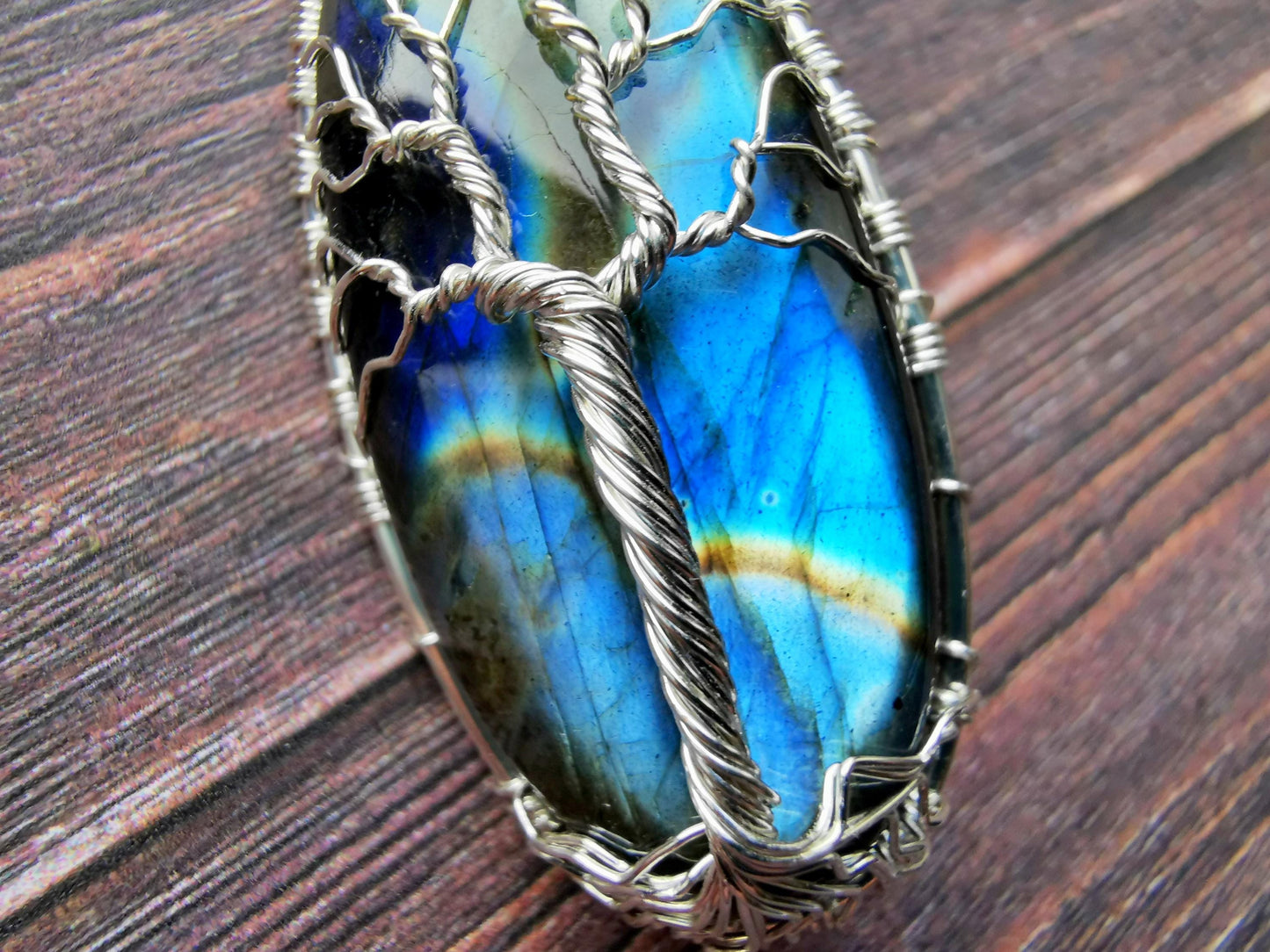 Tree brooch with a labradorite gemstone