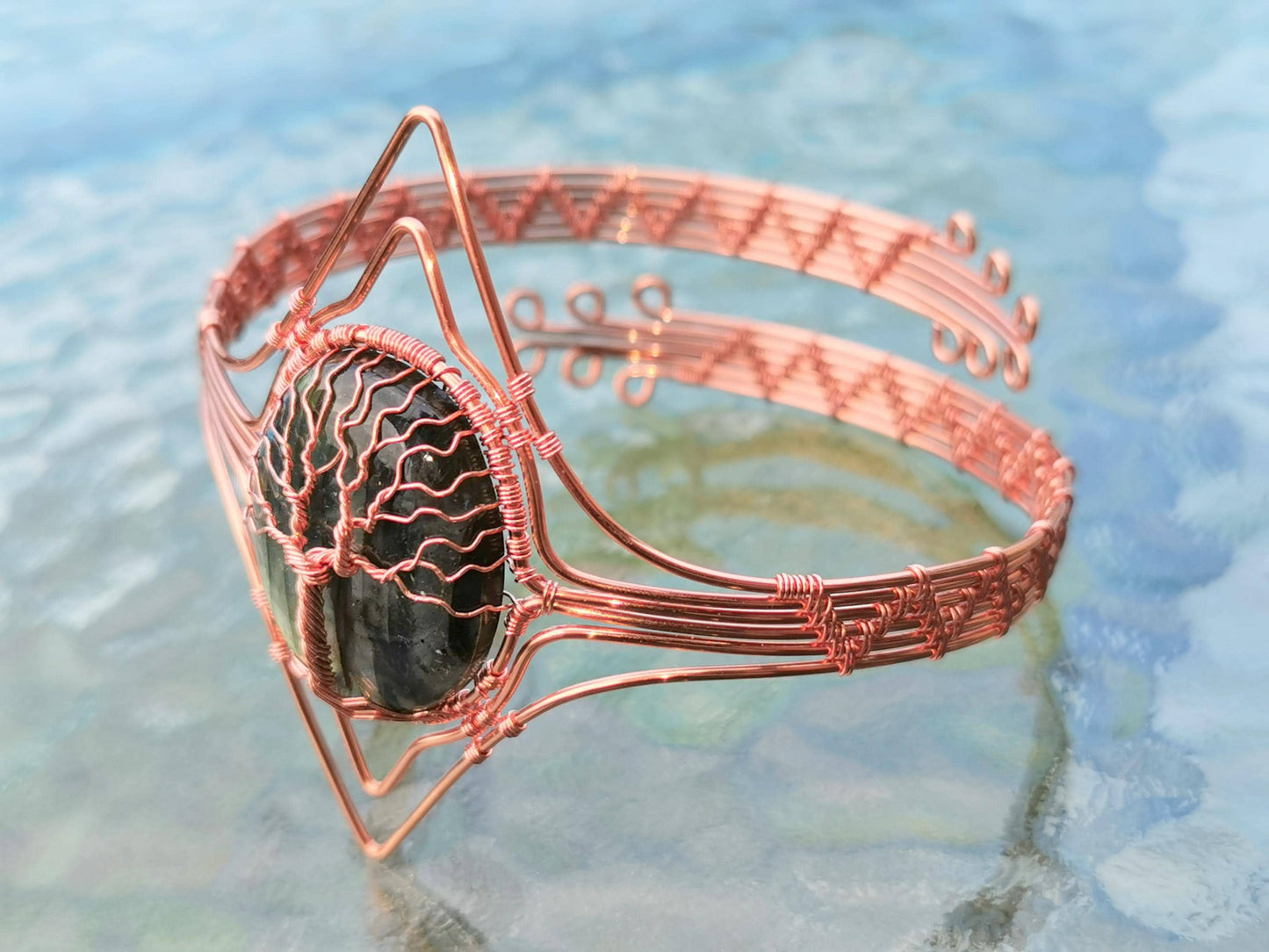 Tree arm ring with a labradorite gemstone