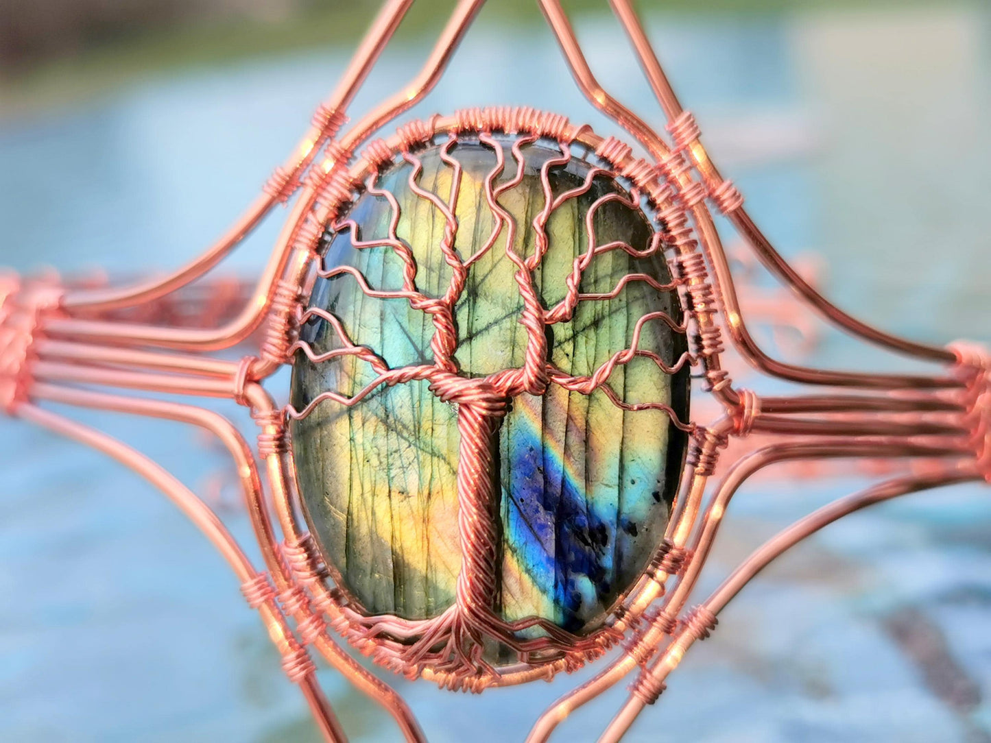 Tree arm ring with a labradorite gemstone