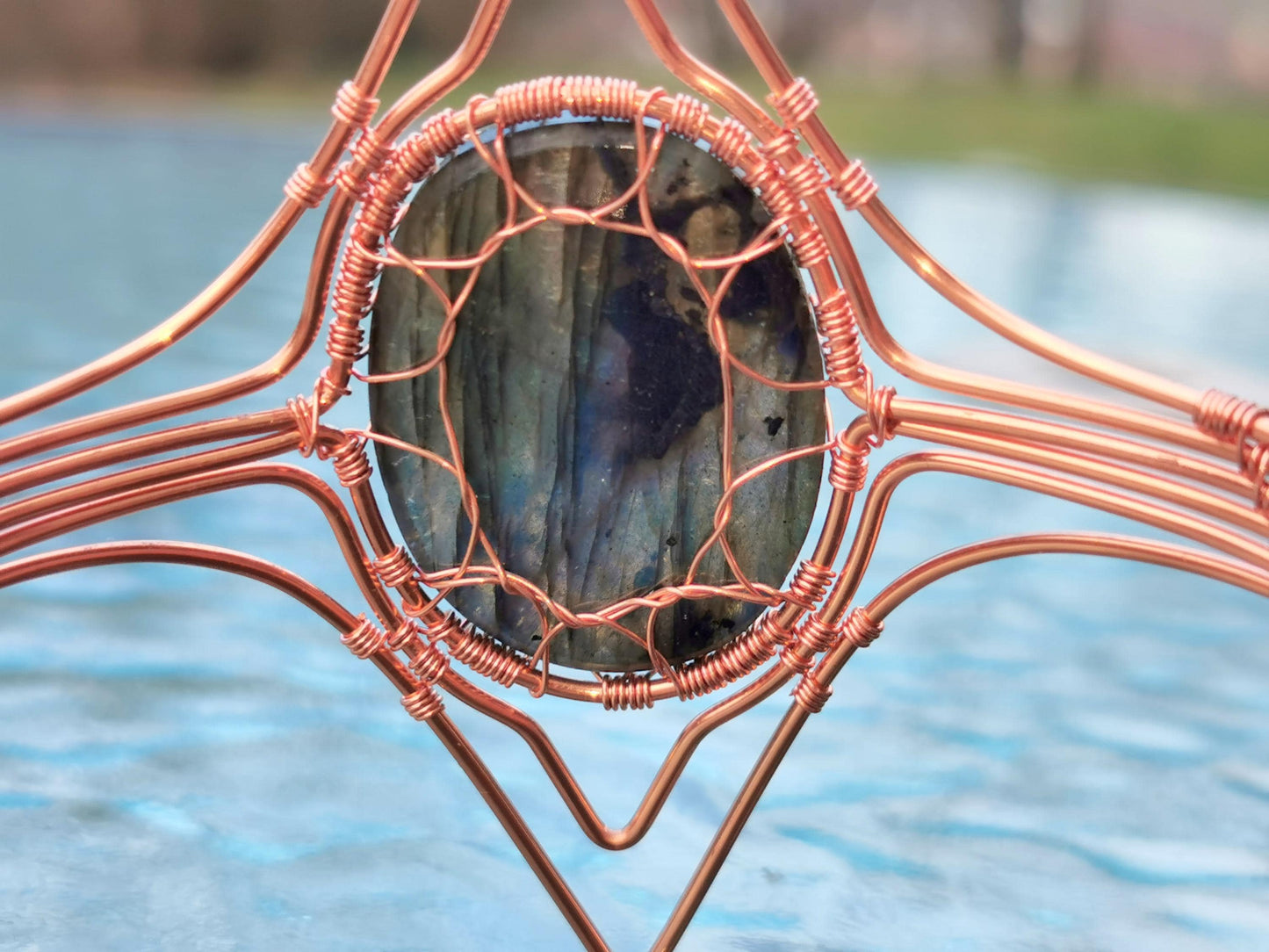Tree arm ring with a labradorite gemstone