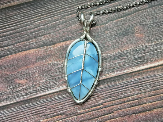 Leaf pendant with a blue opal gemstone