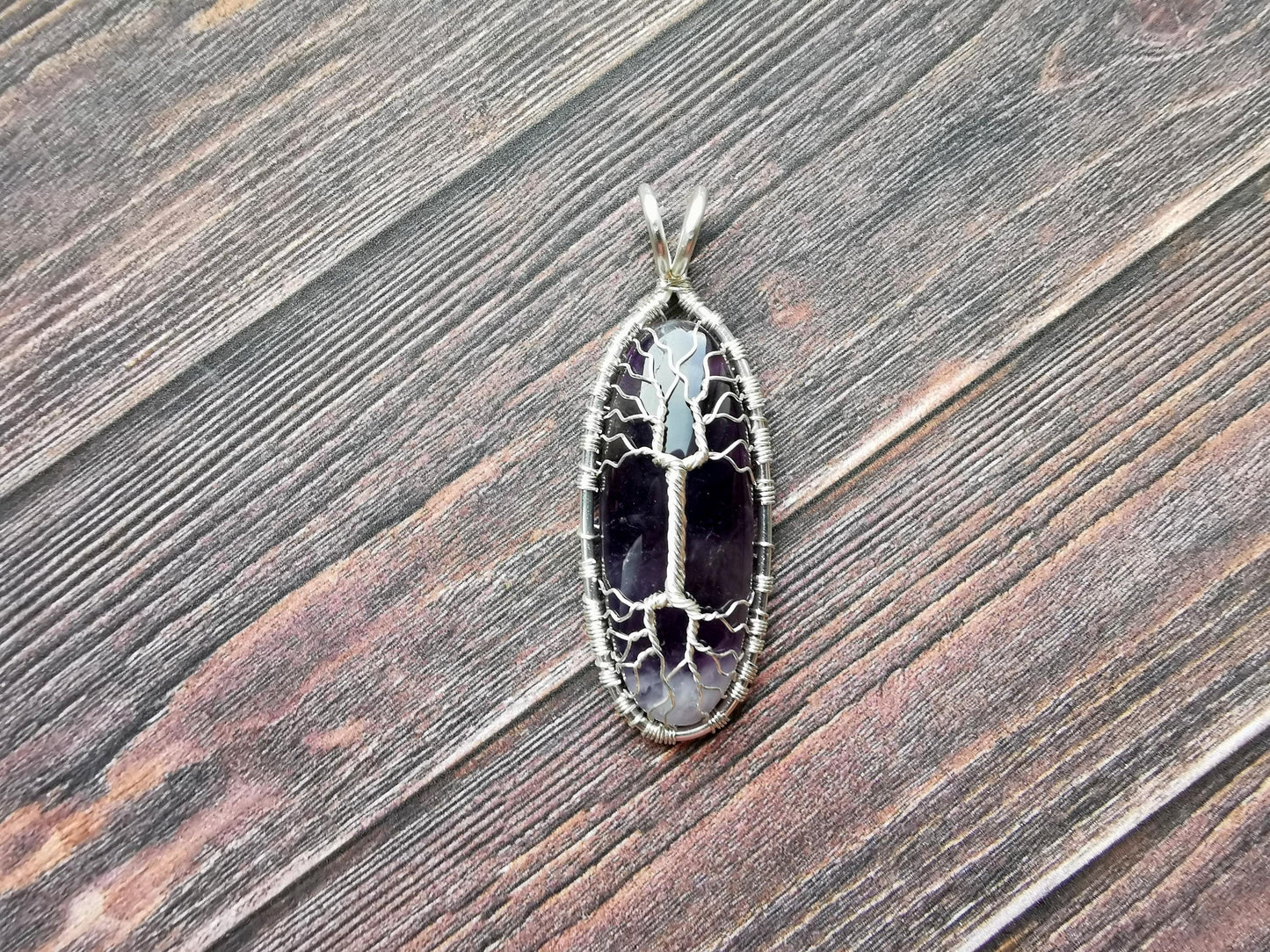 Tree pendant with an amethyst gemstone