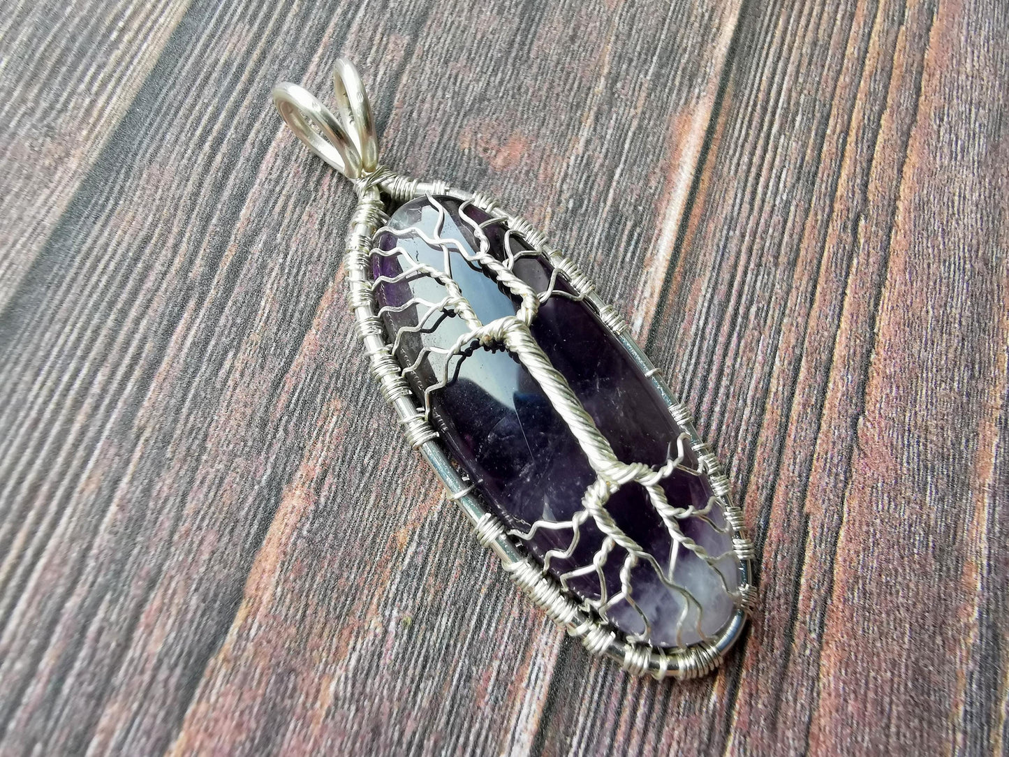 Tree pendant with an amethyst gemstone