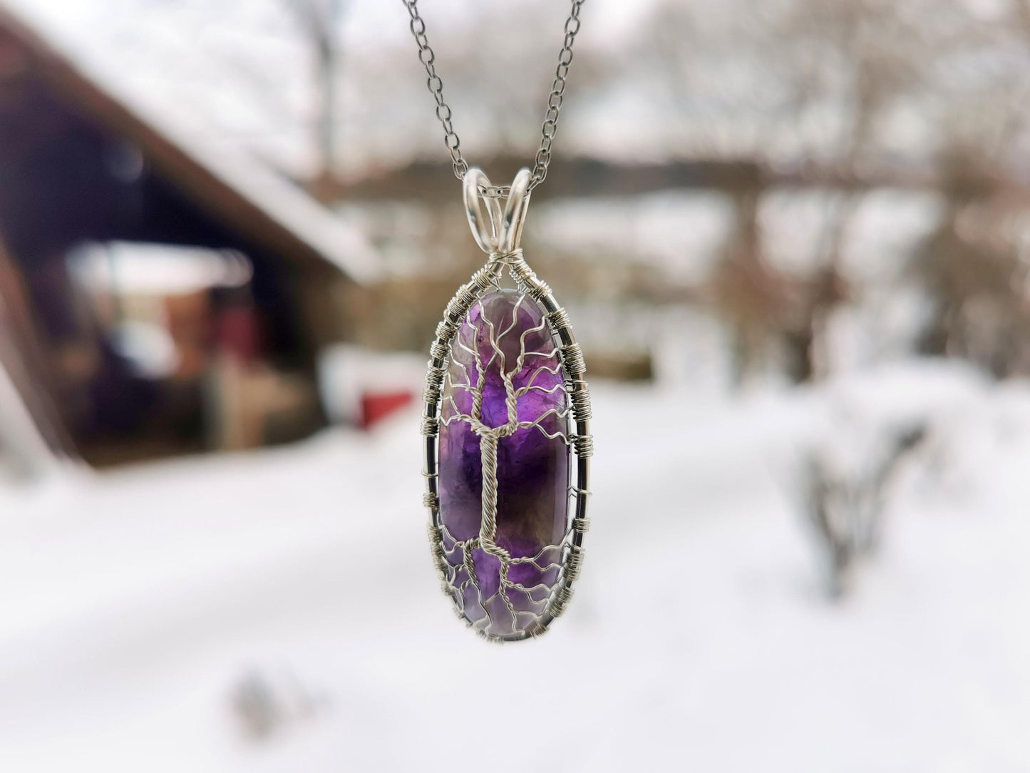 Tree pendant with an amethyst gemstone