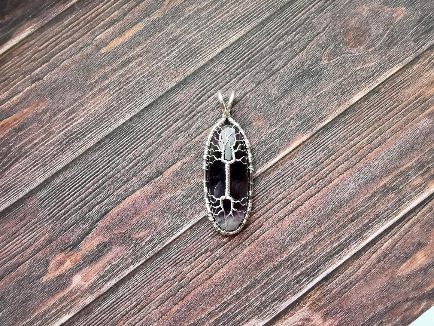 Tree pendant with an amethyst gemstone