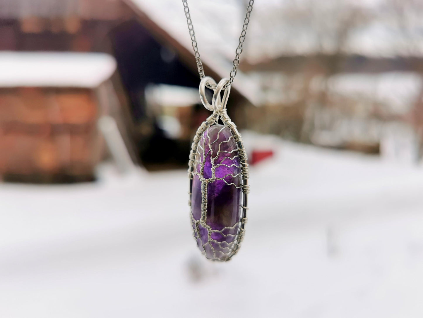 Tree pendant with an amethyst gemstone