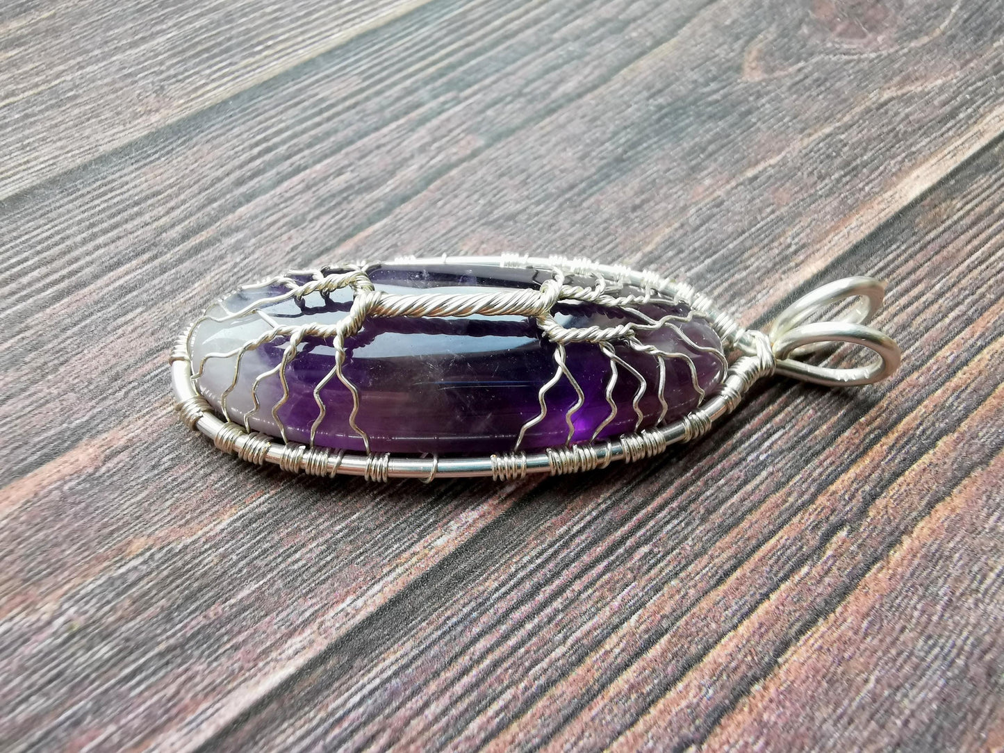 Tree pendant with an amethyst gemstone