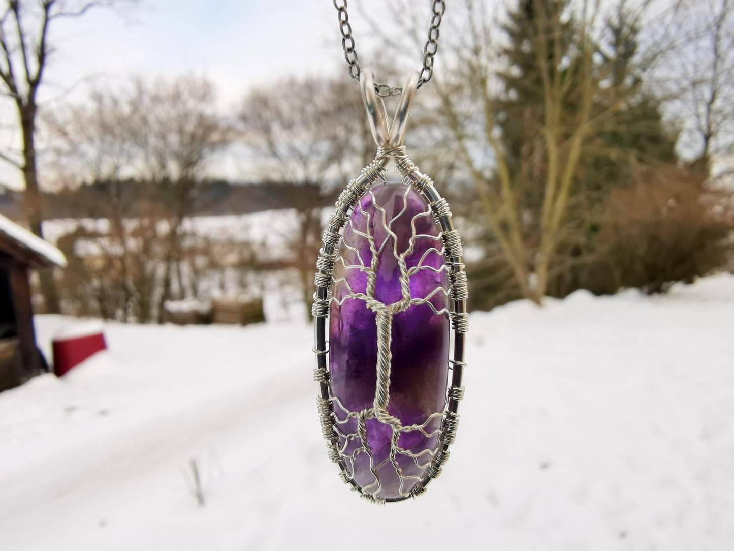Tree pendant with an amethyst gemstone